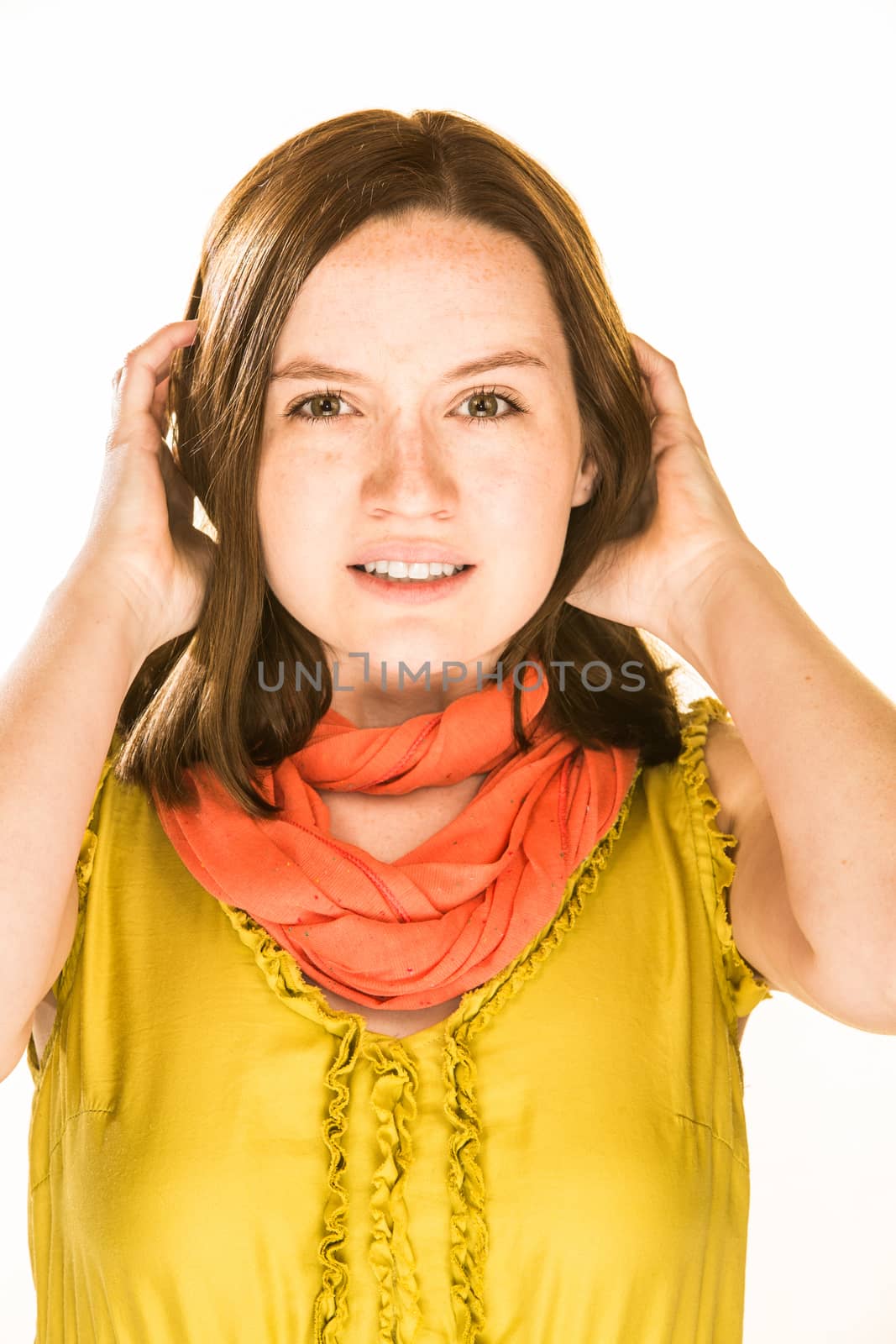 Pretty girl with a stressed expression on white background