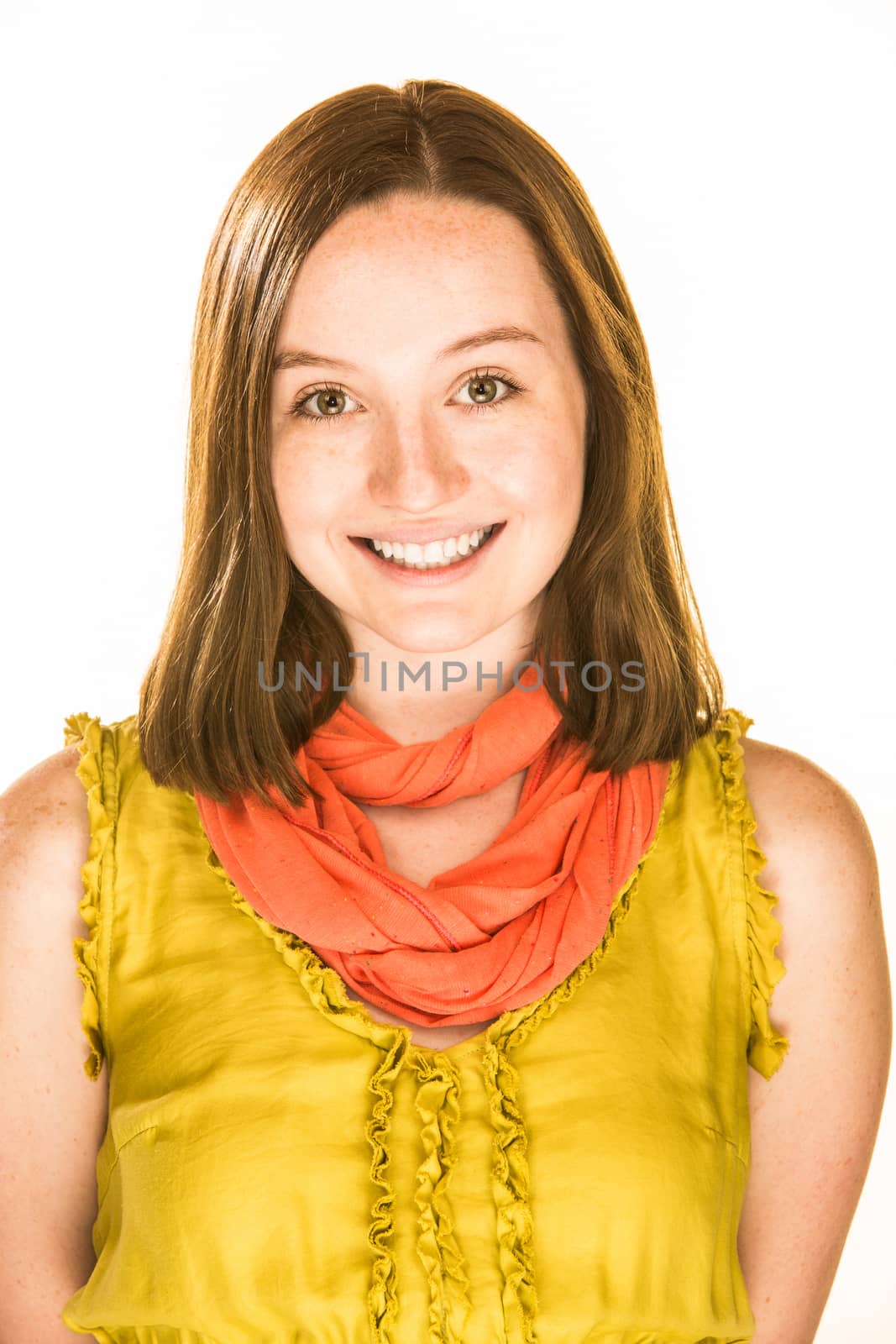 Pretty girl with a friendly expression on white background