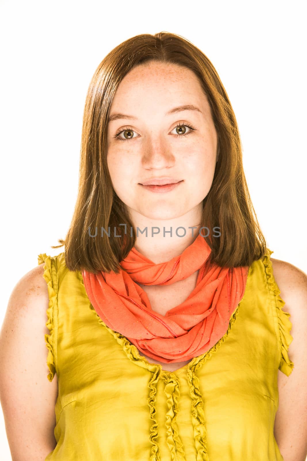 Pretty girl with a kind expression on white background
