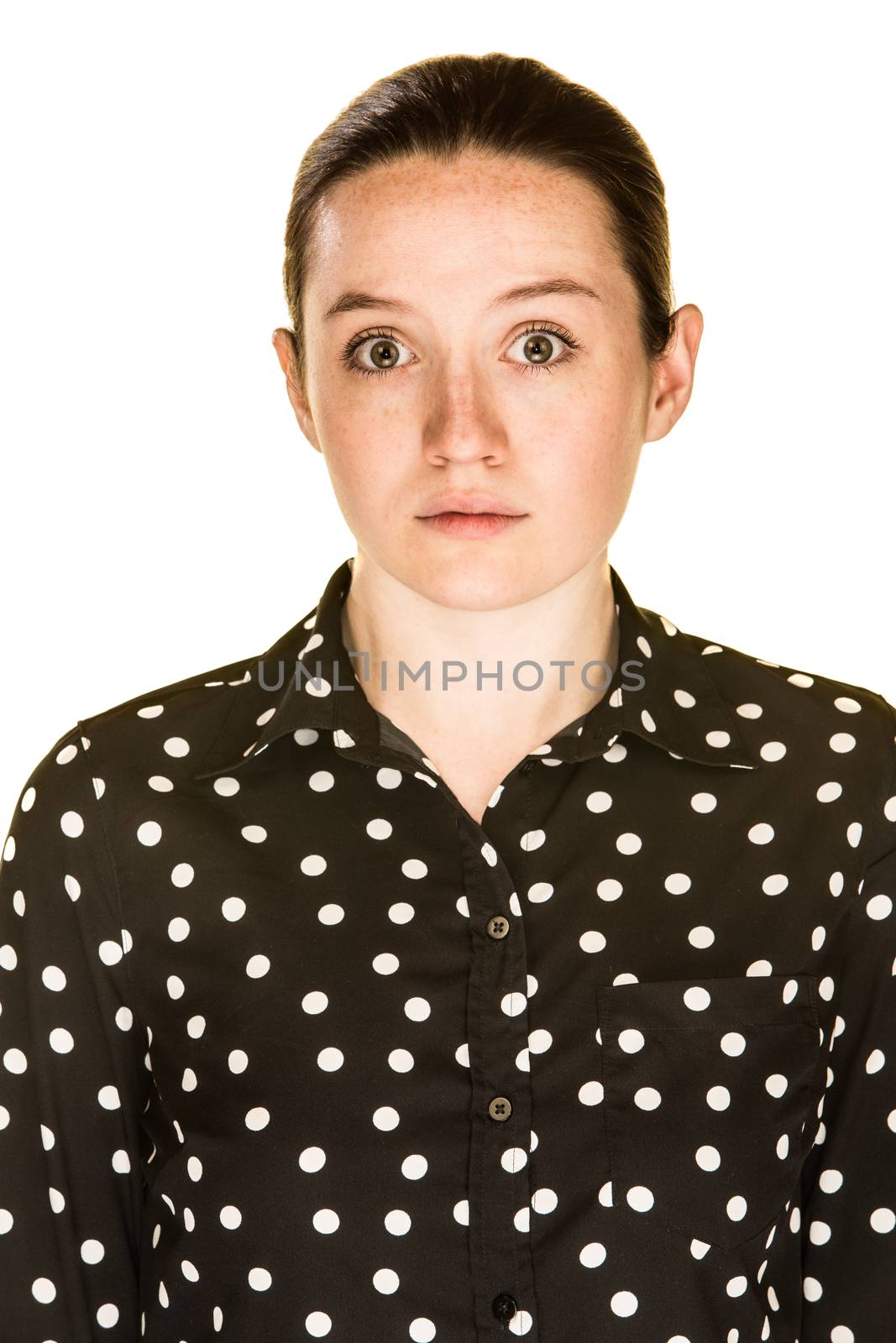 Scared looking caucasian girl on white background