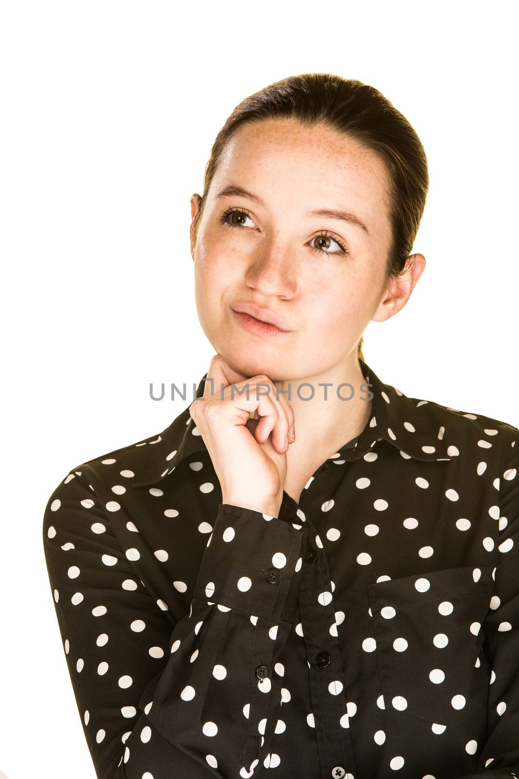 Young caucasian woman lost deep in thought