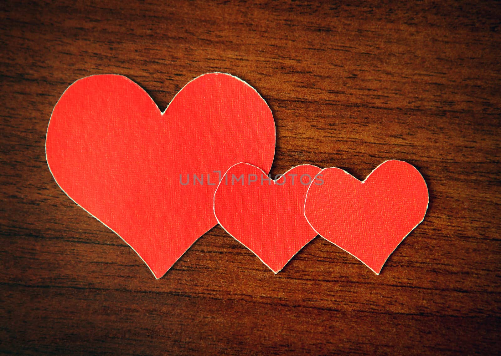 Heart Shapes on the Wooden Background by sabphoto