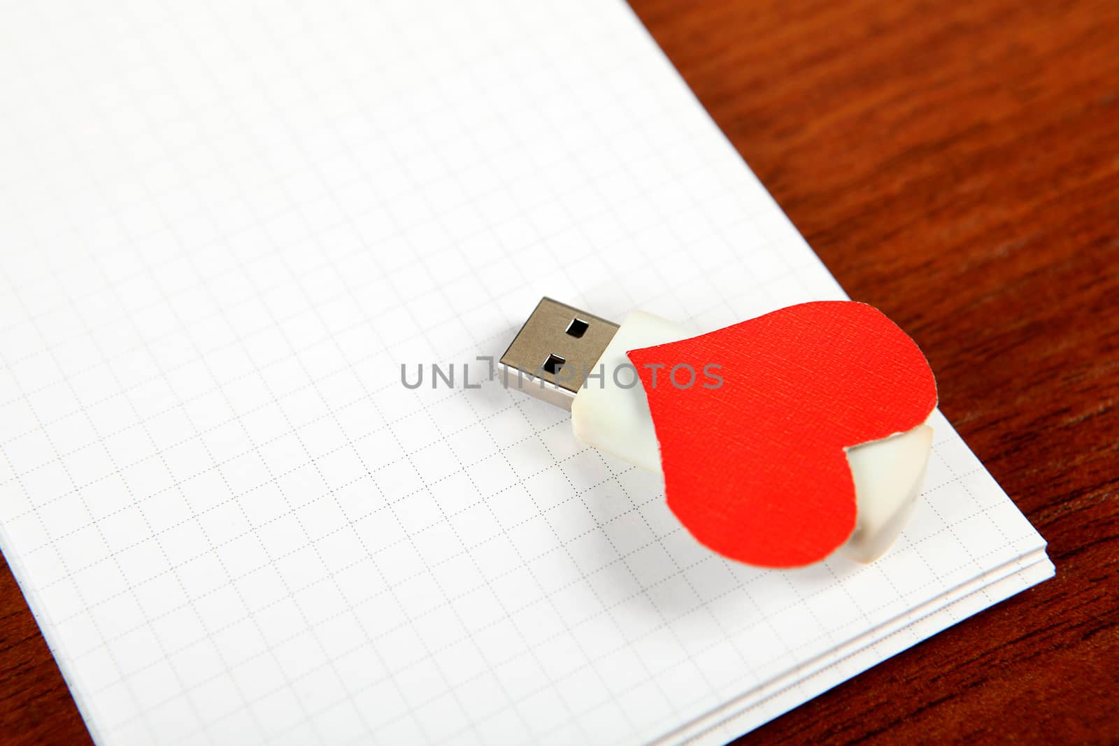 USB Flash Drives with Heart Shape on the Blank Note Pad