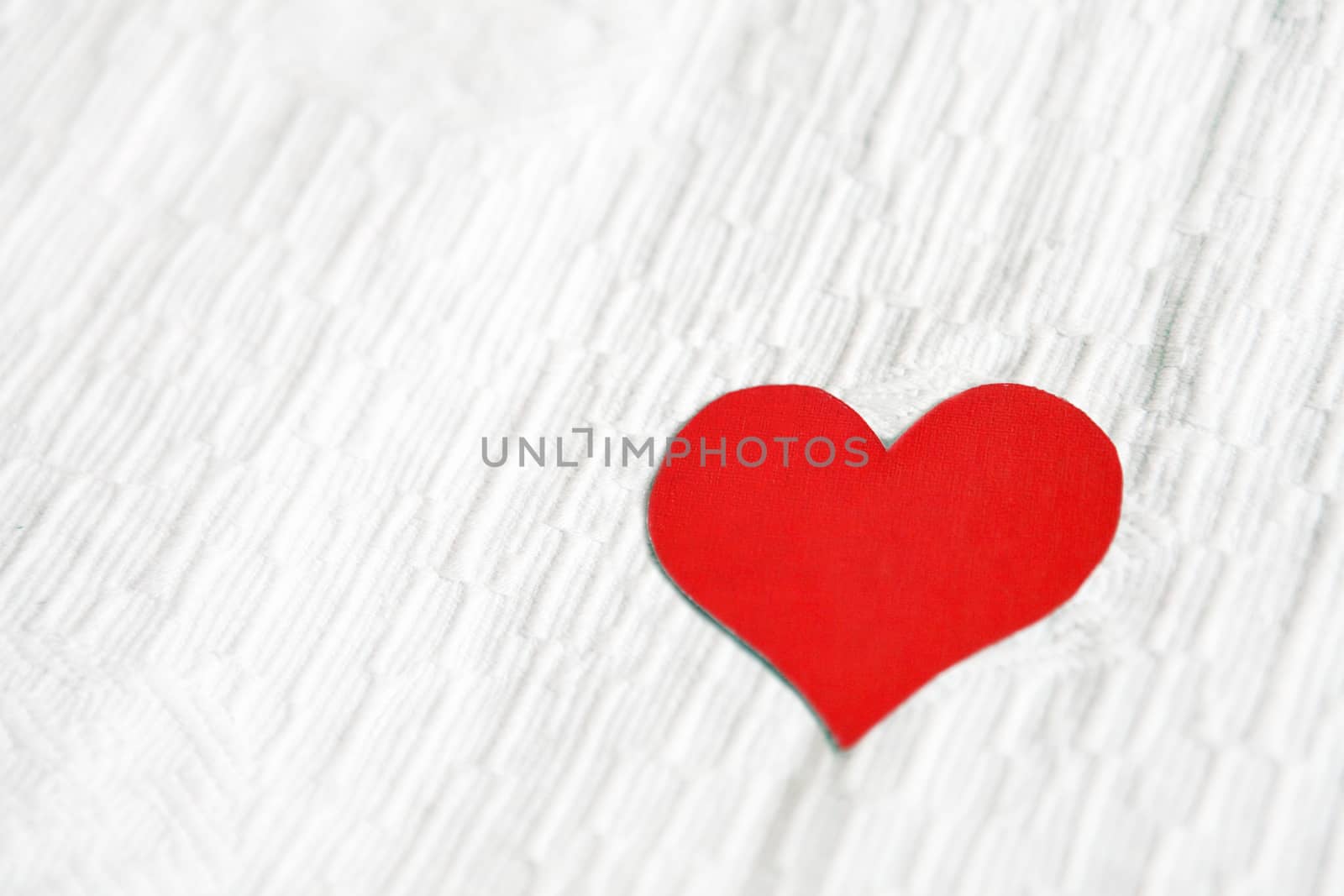 Heart Shape on the Fabric Background by sabphoto