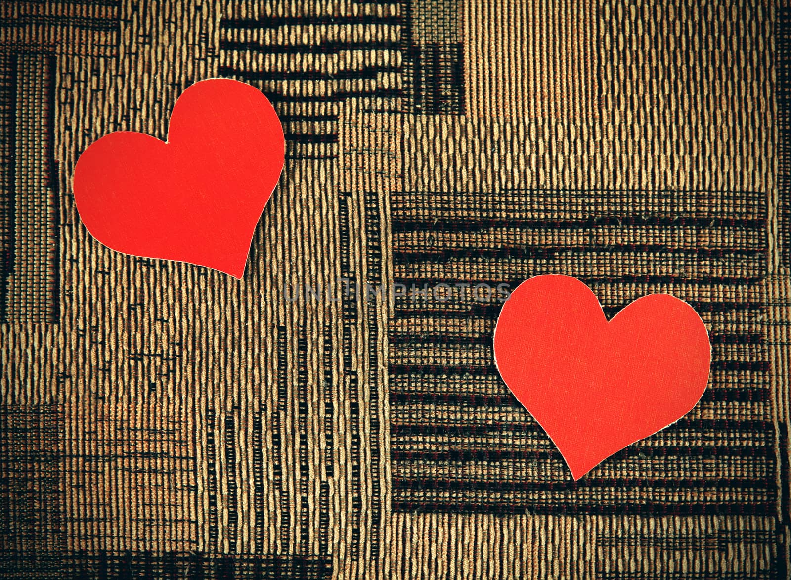 Two Heart Shapes on the Fabric Background