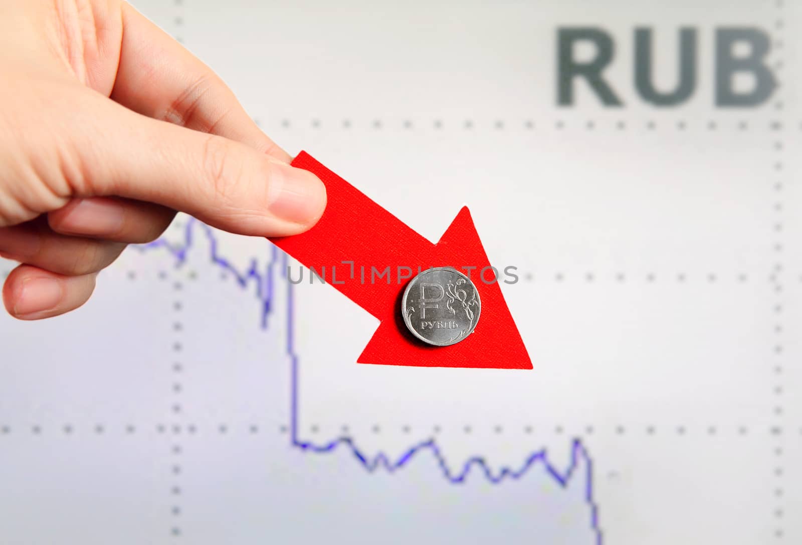 Red Arrow in a Hand with Russian Ruble Down on the Diagram Background