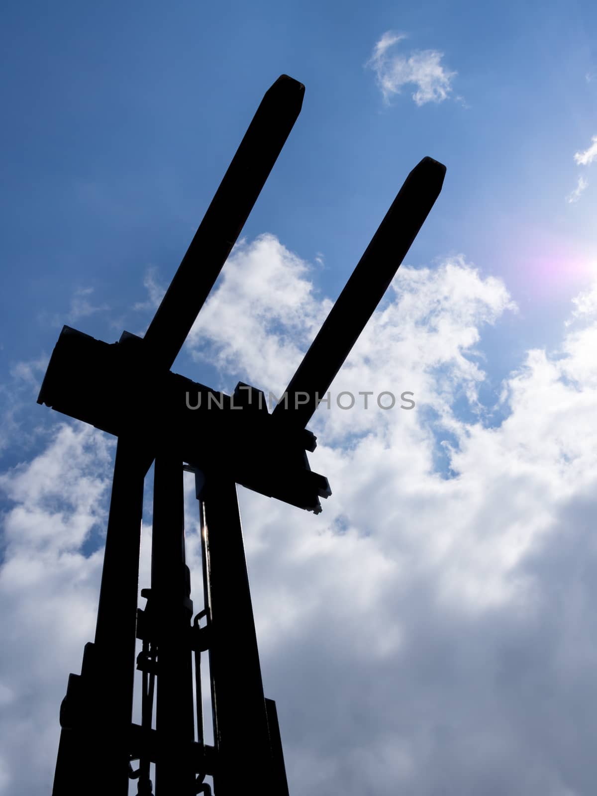 Forklifts in backlight