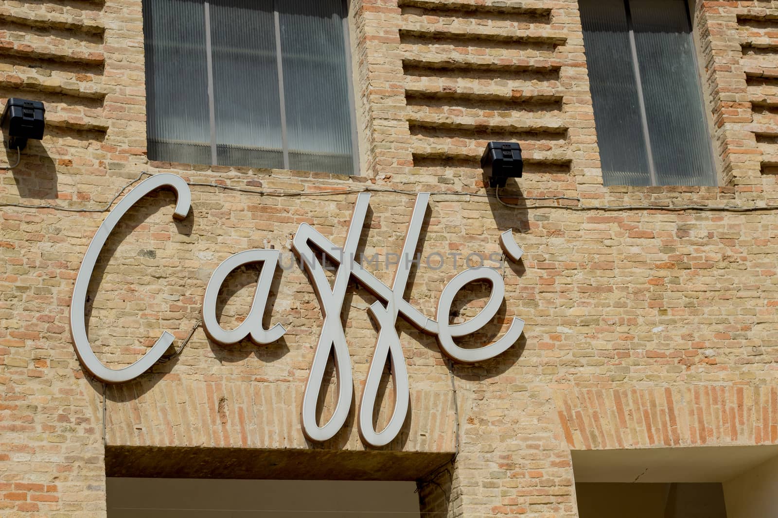 Old commercial sign for bar in Italy