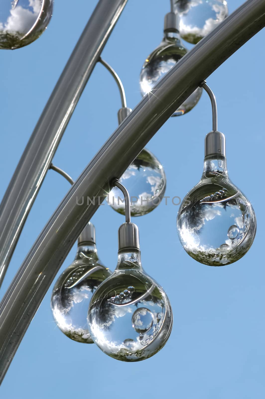 decorative glass spheres hanging from a metal frame