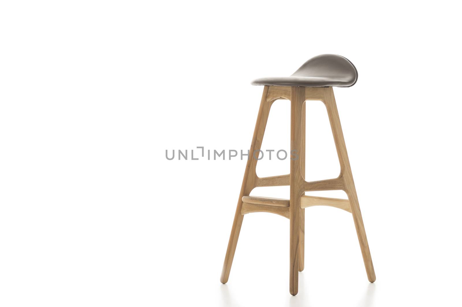 Tall Wooden Leg Stool on White by MOELLERTHOMSEN