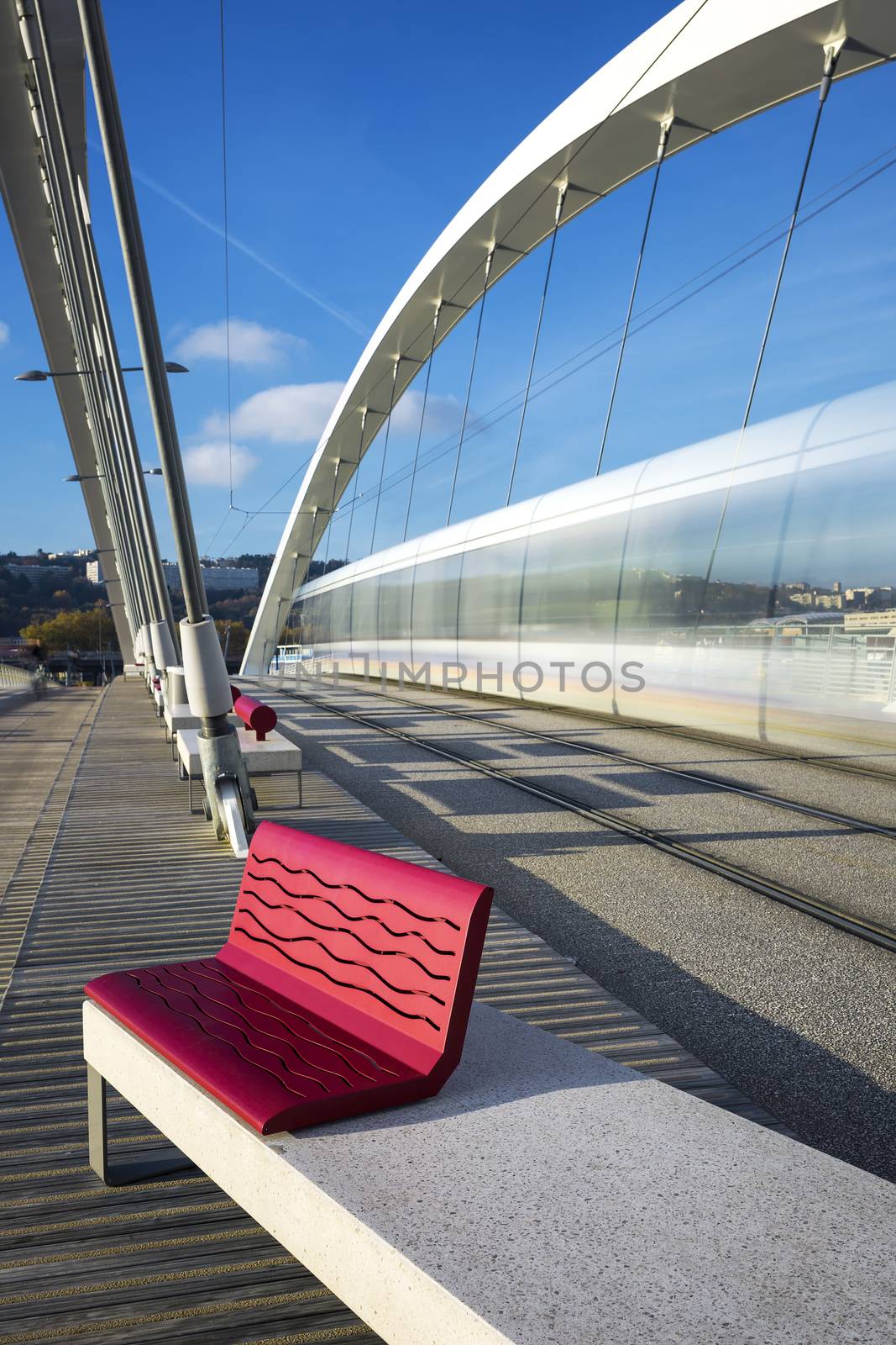 View of tramway crossing a bridge, Lyon, France. 