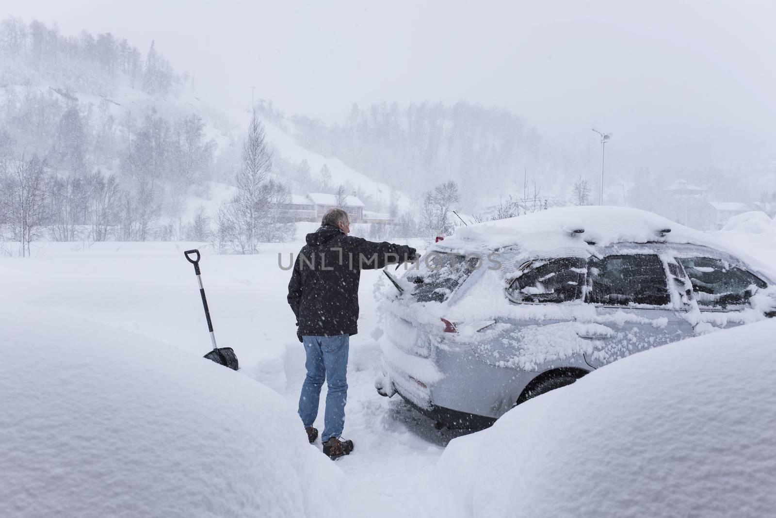 Shoveling snow of a car by GryT