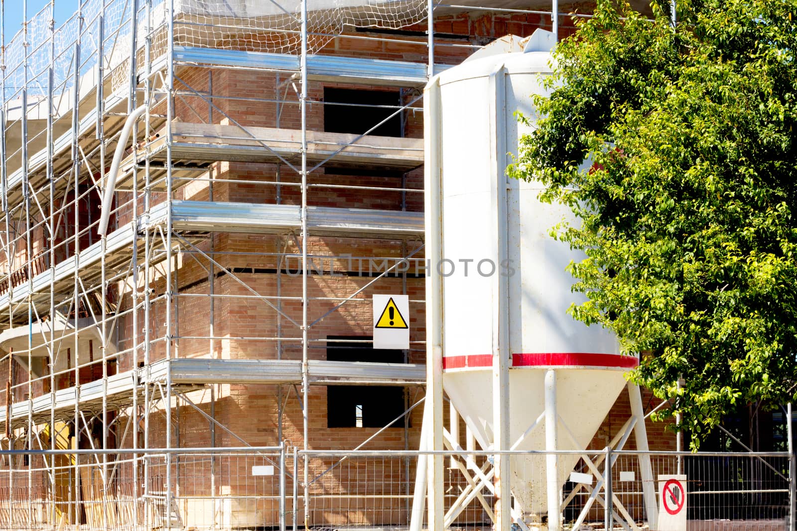 small house with a garden under construction