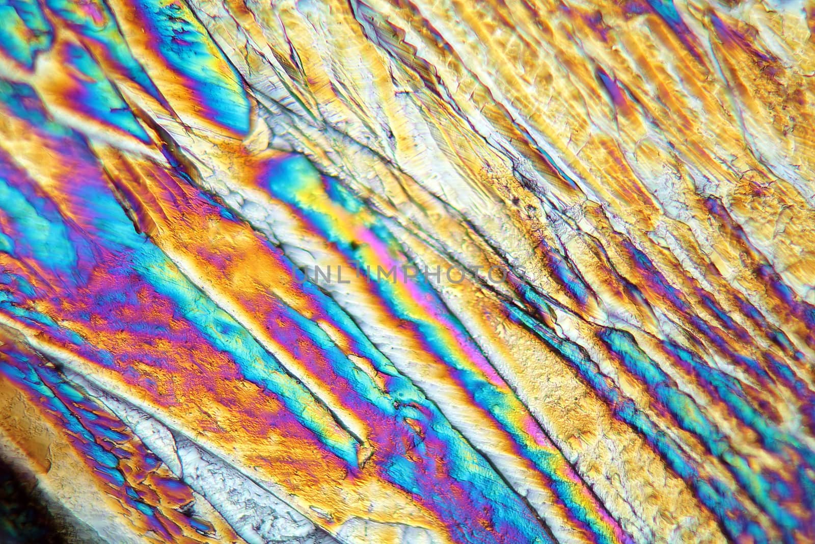 Copper sulfate under the microscope (magnification 80x and polarized light). Copper sulfate is used for many purposes in farming, medicine, industry and science.
