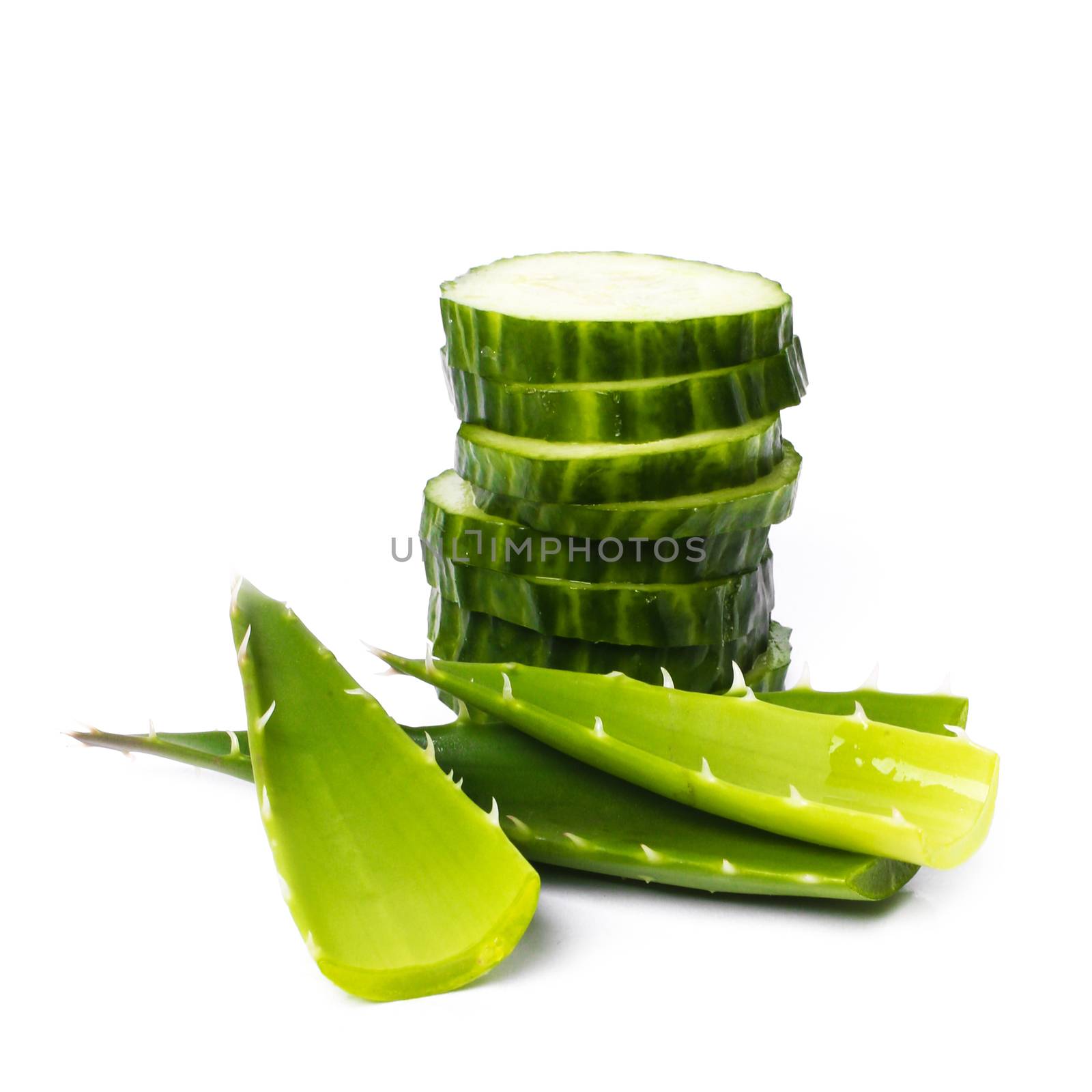 Green cucumber with aloe on a white background