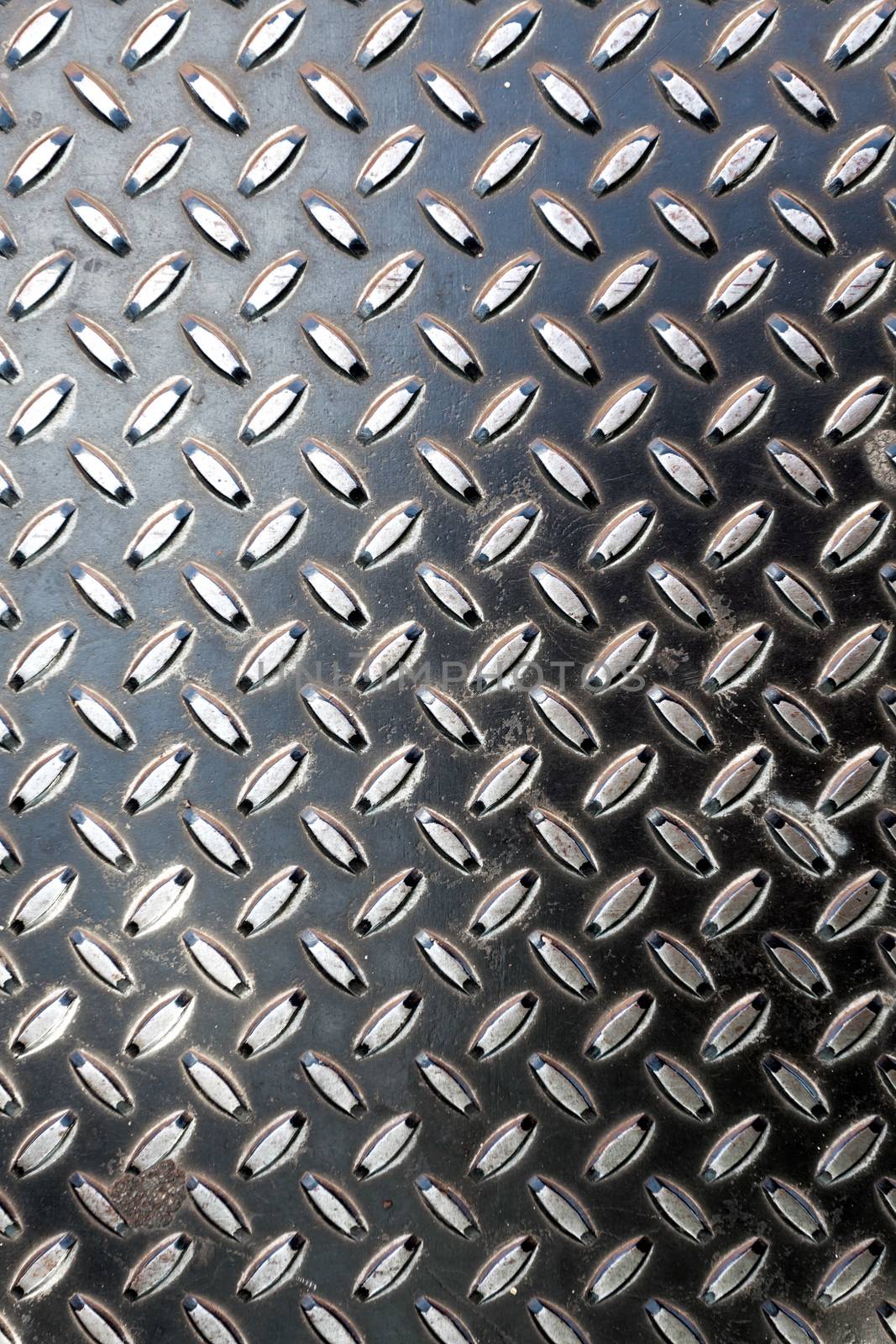 Closeup of real diamond plate metal material. This is the real thing and not an illustration.