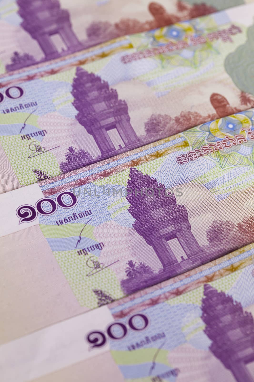 Different Cambodia Riels banknotes on the table