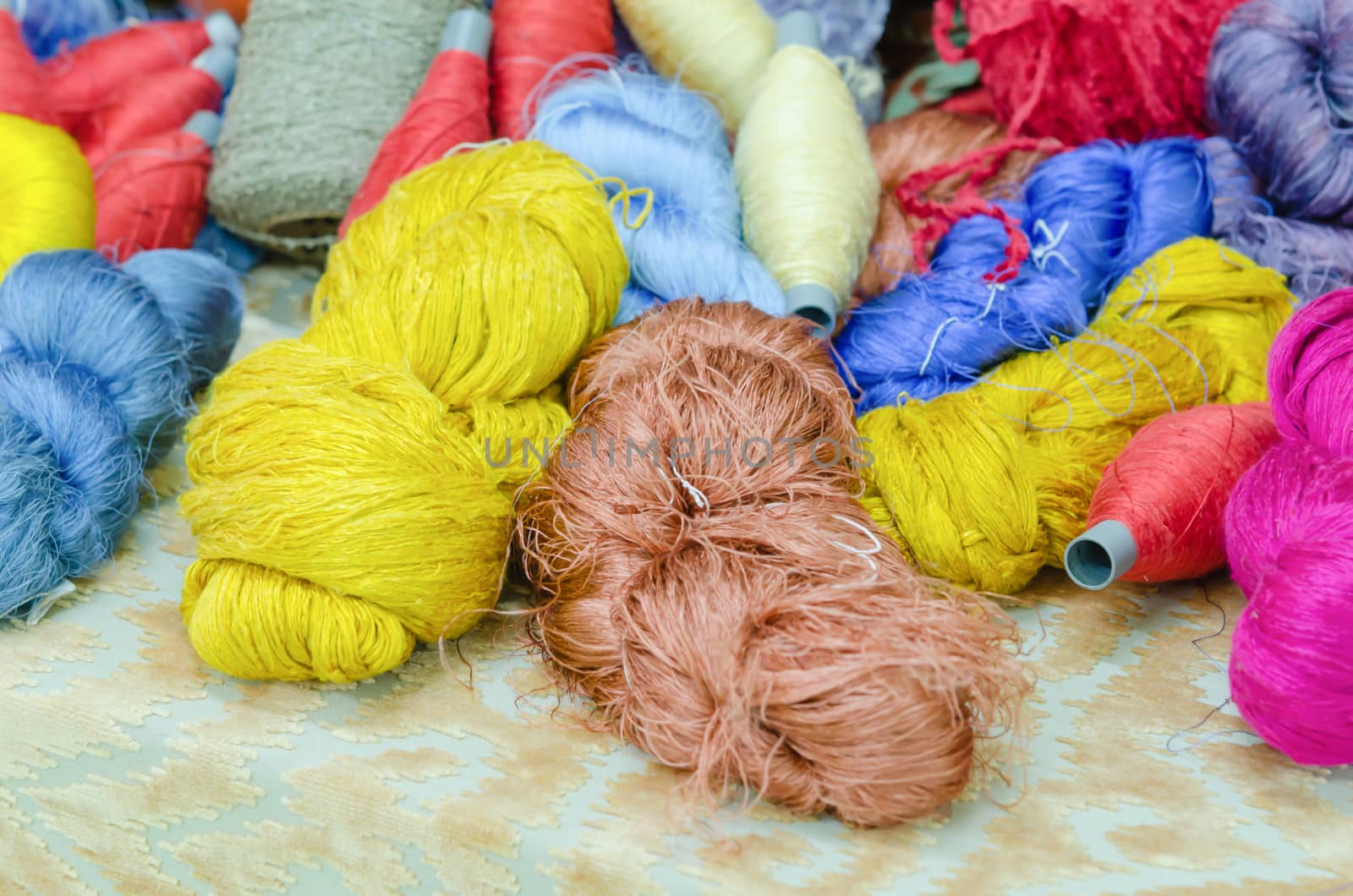 colorful silk yarns being dried