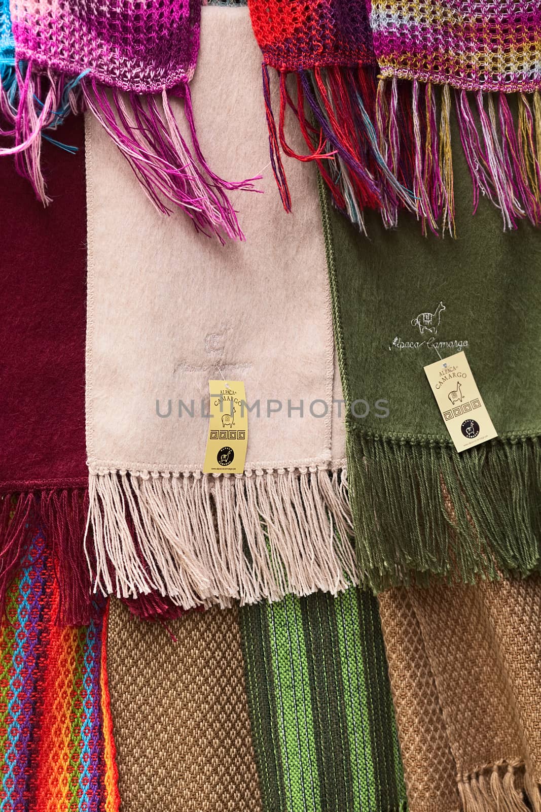 LA PAZ, BOLIVIA - NOVEMBER 10, 2014: Alpaca scarves hanging at a shop on Linares street in the city center on November 10, 2014 in La Paz, Bolivia