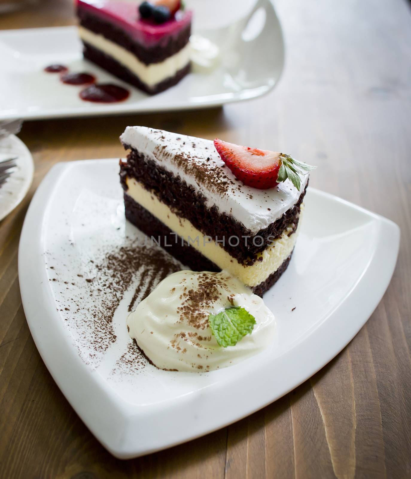 chocolate cake and rasberry cake