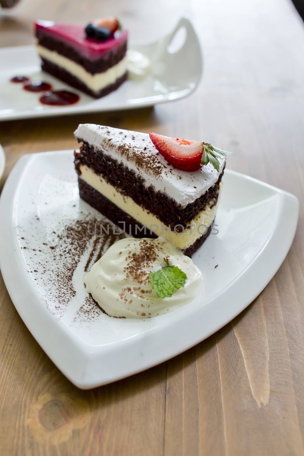 chocolate cake and rasberry cake