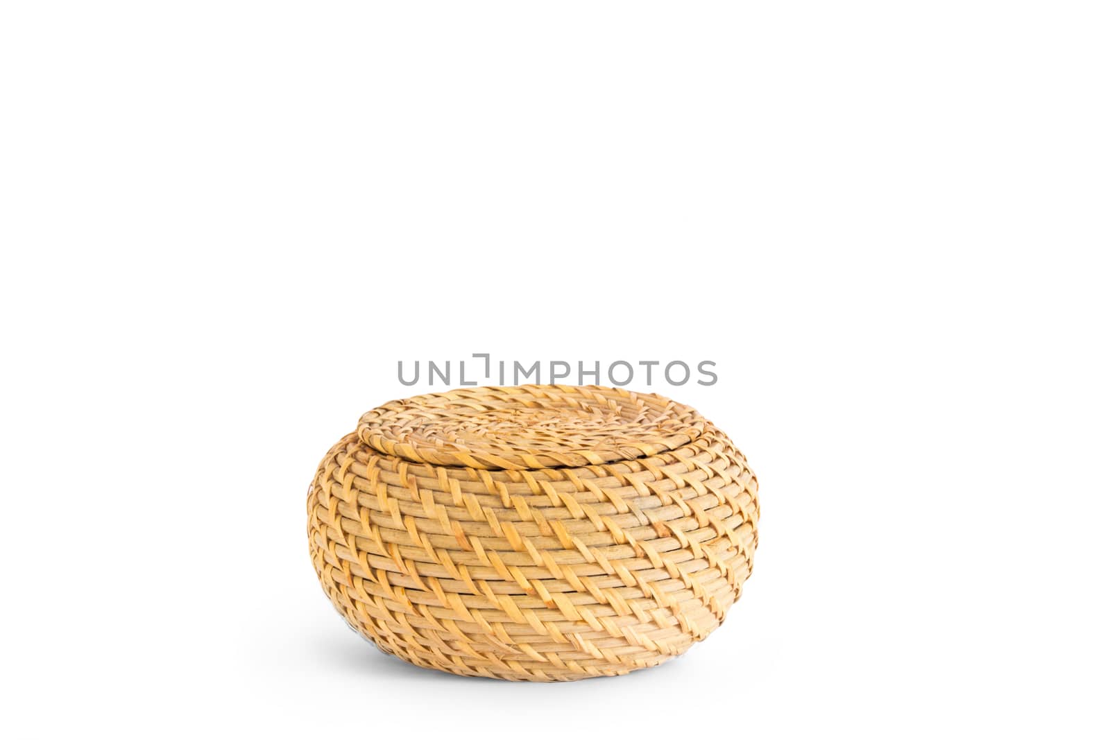 Straw basket closed with content to discover and open