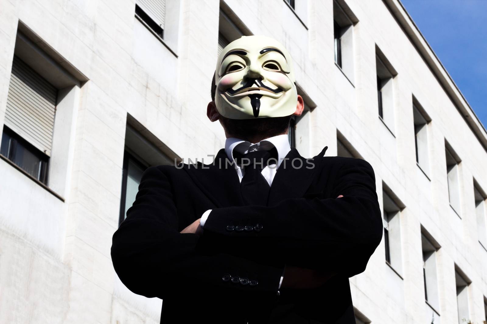 Anonymus business man head-on, with mask