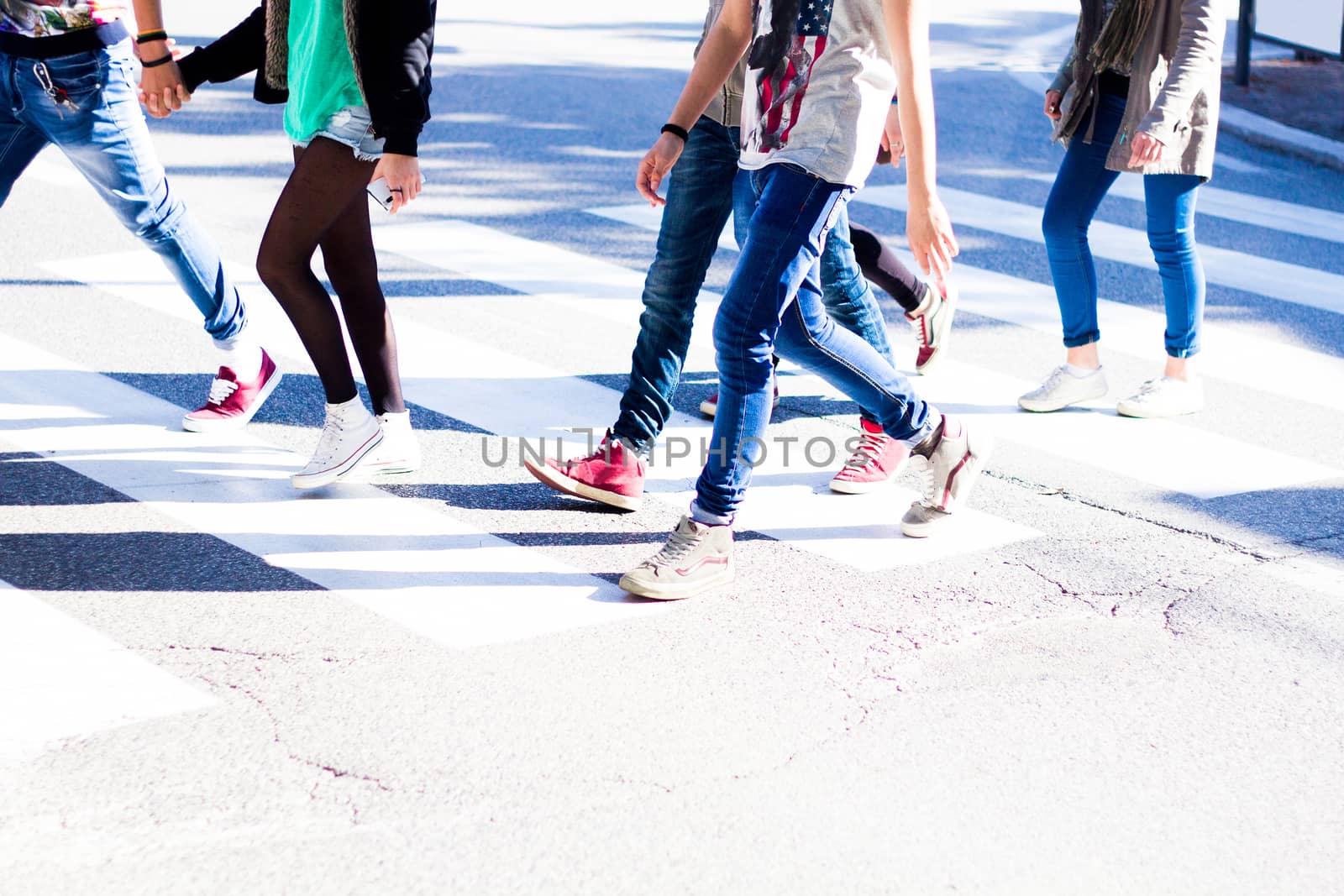 boys crossing the pedestrian crossing by Carbonas