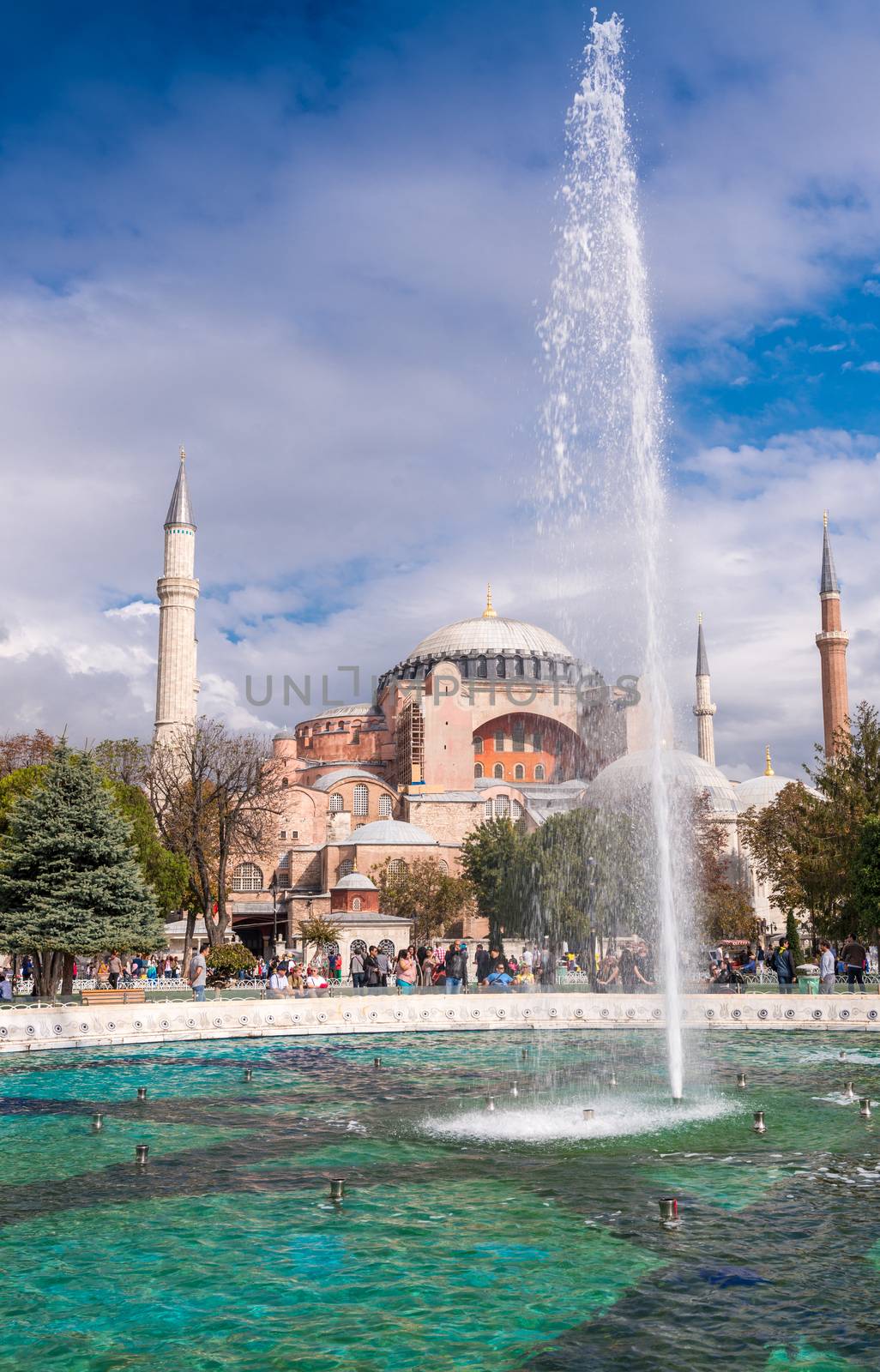 ISTANBUL, TURKEY - SEPTEMBER 14, 2014: Tourists walk in Sultanahmet Square. More than 10 million people visit Istanbul annually.