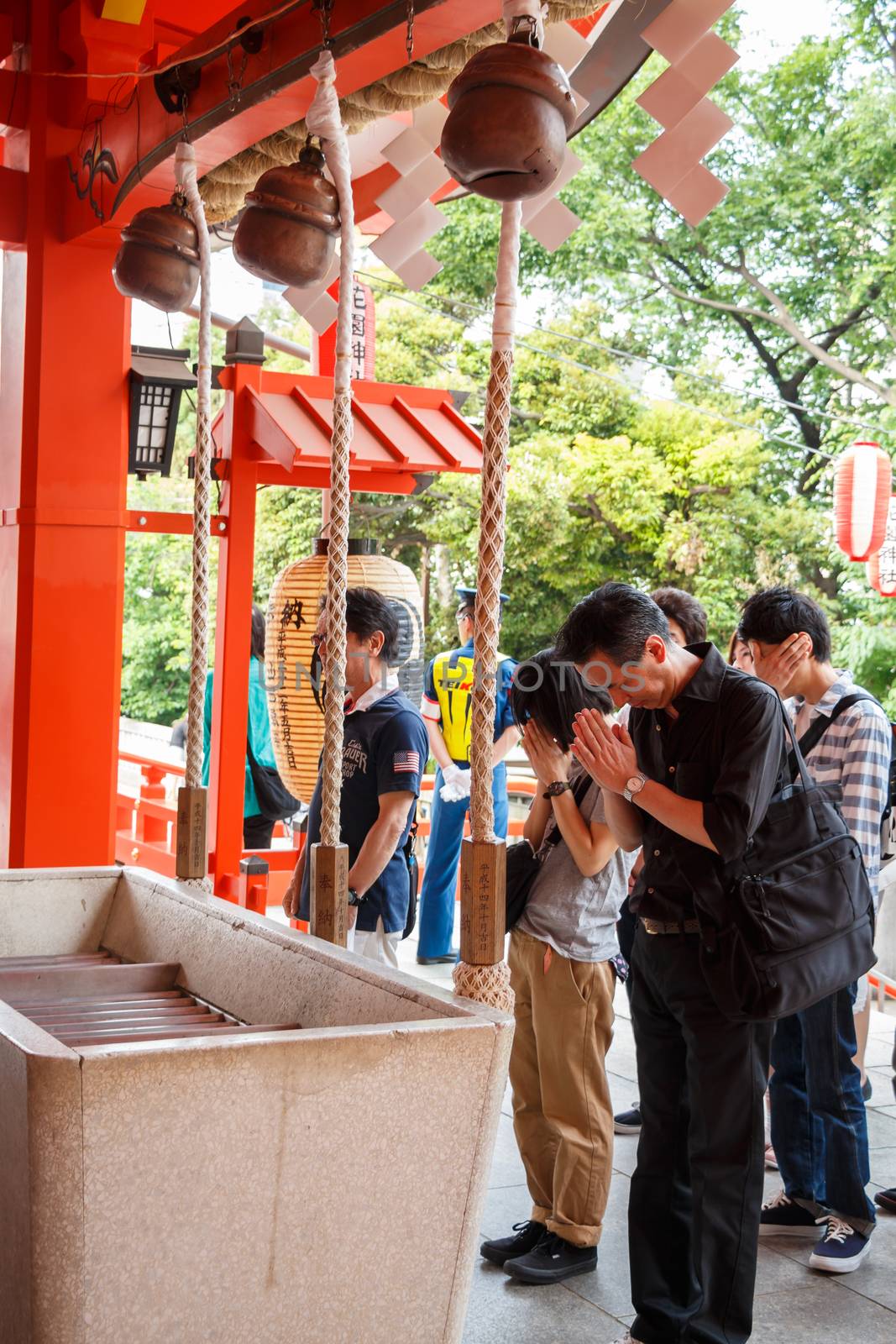 Tokyo,Japan - May 25, 2014 Many people donate money and benediction at temple Tokyo,Japan