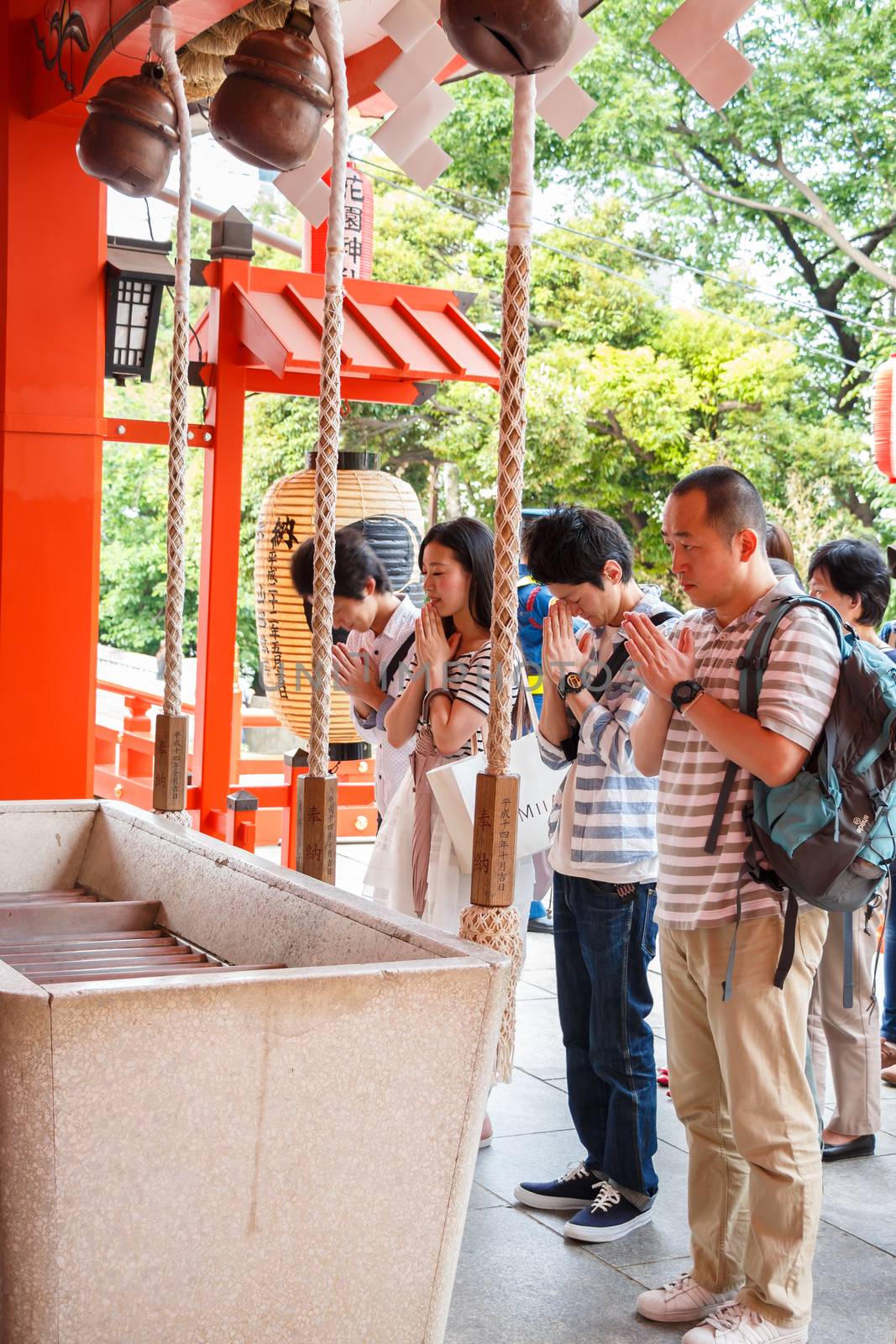 Tokyo,Japan - May 25, 2014 Many people donate money and benediction at temple Tokyo,Japan