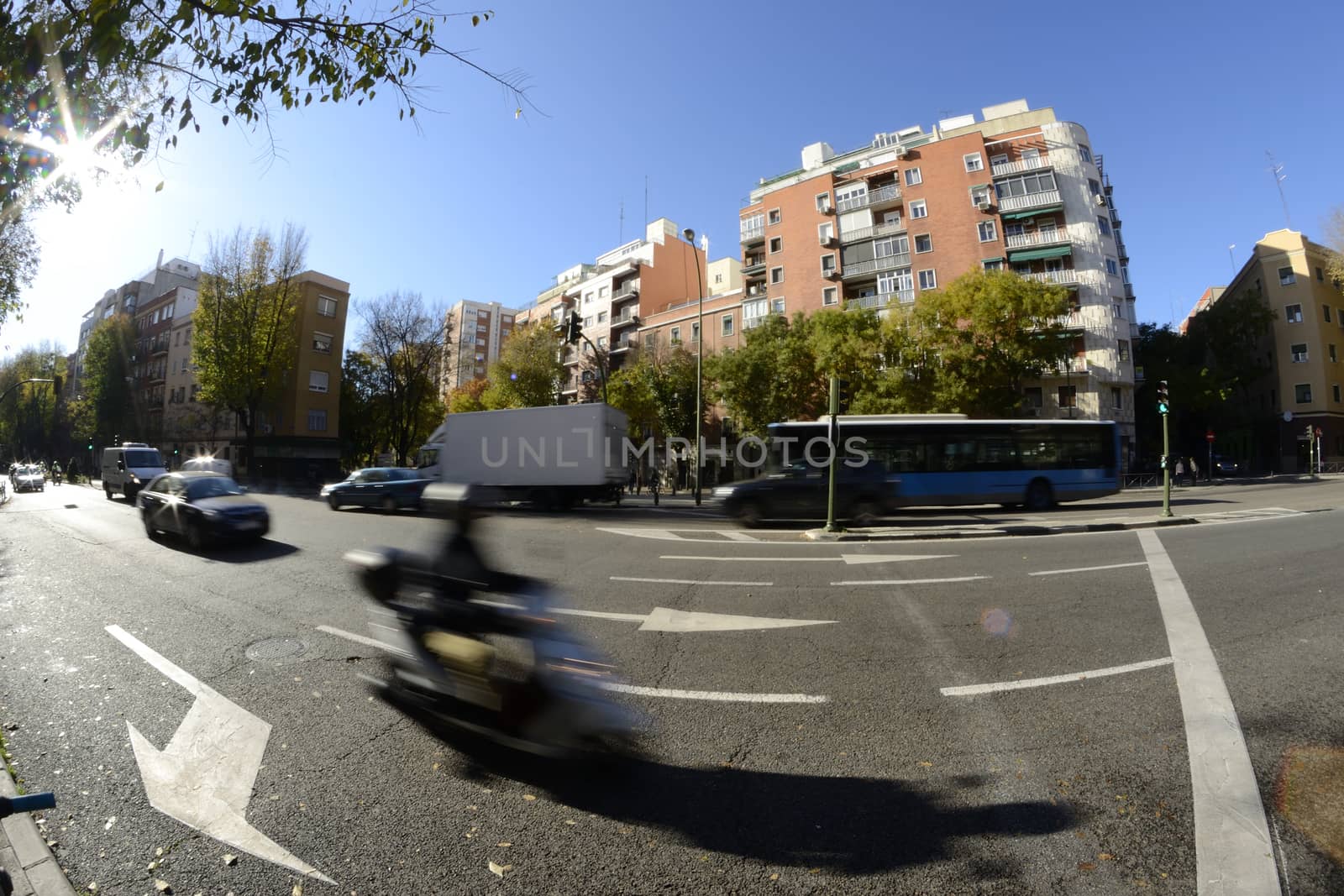 street in movement through a fisheye lens. Sunny day