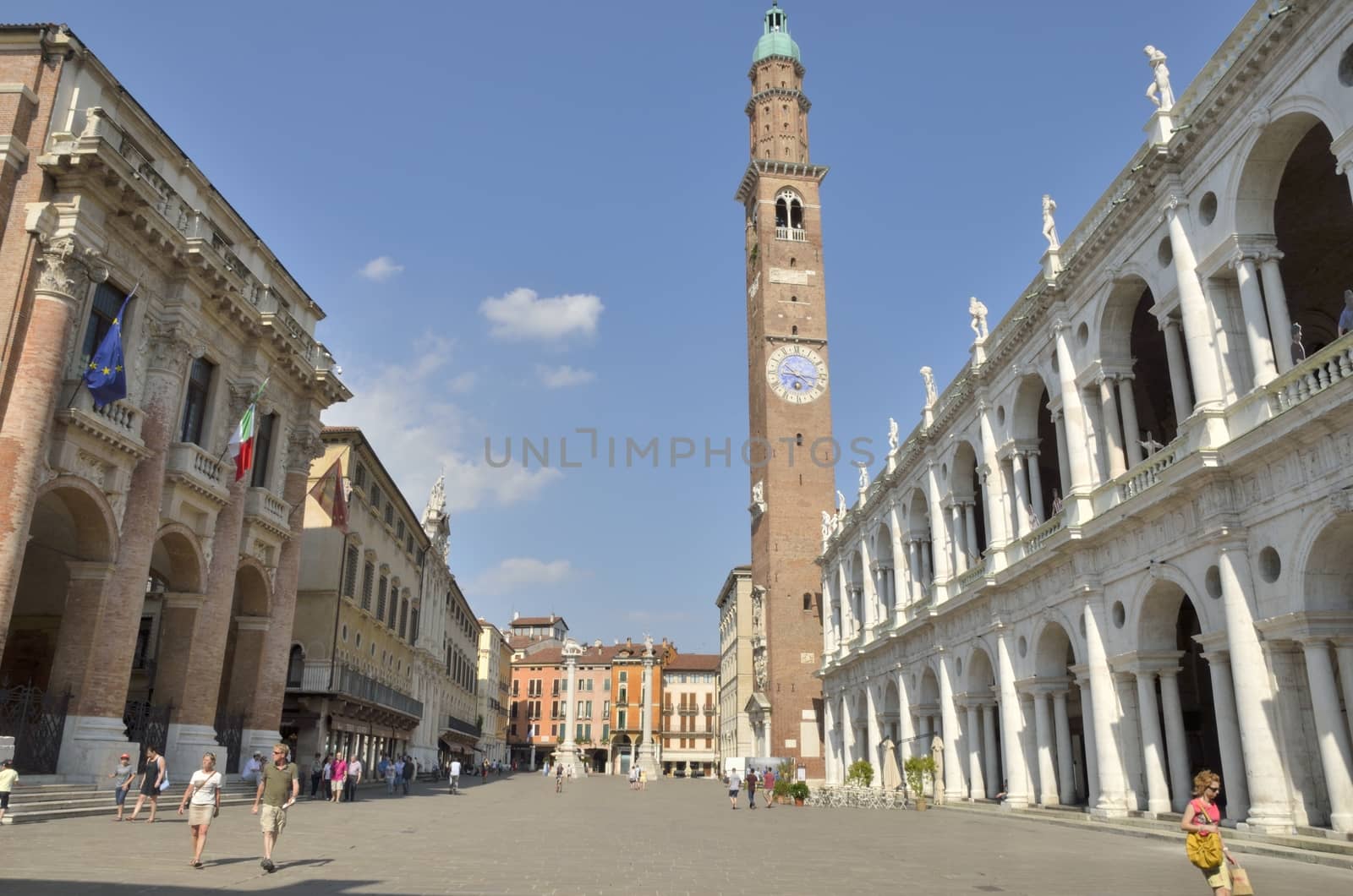 Bissara Tower rises above the Square of the Lords, the main square of Vicenza in the Veneto region of northeast Italy. The clock on the tower was designed by 14th century architect and sculptor Andrea Pisano 