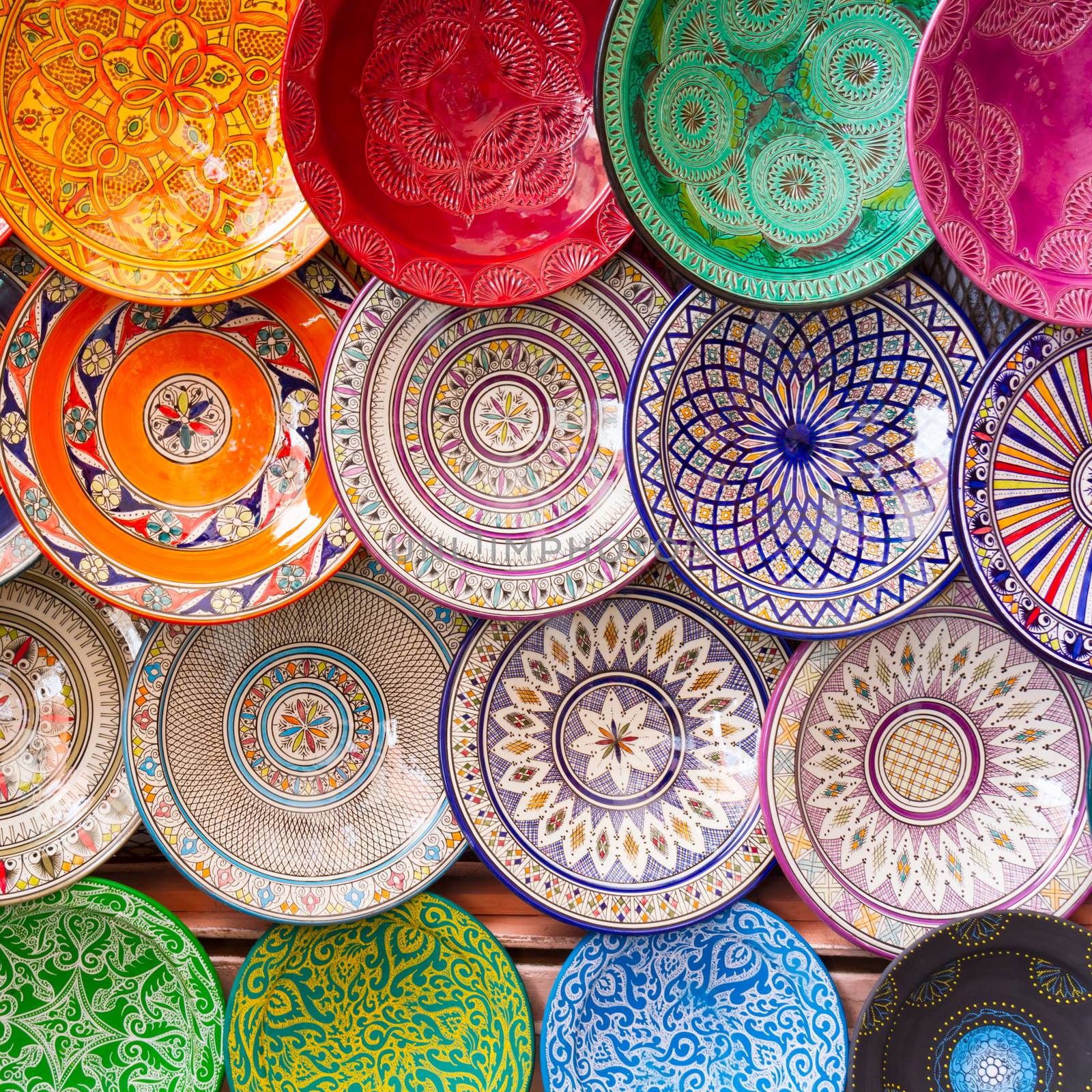 Traditional arabic handcrafted, colorful decorated plates shot at the market in Marrakesh, Morocco, Africa.