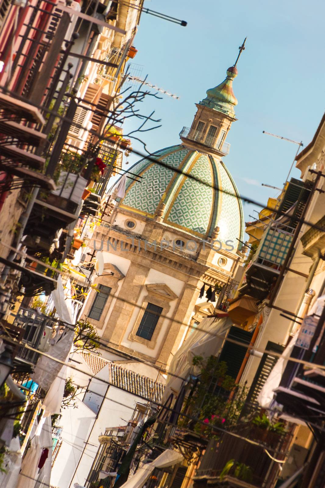 View at the church of San Matteo located in heart of Palermo, Italy, Europe;  tarditional Italian medieval city center with typical narrow residential street.