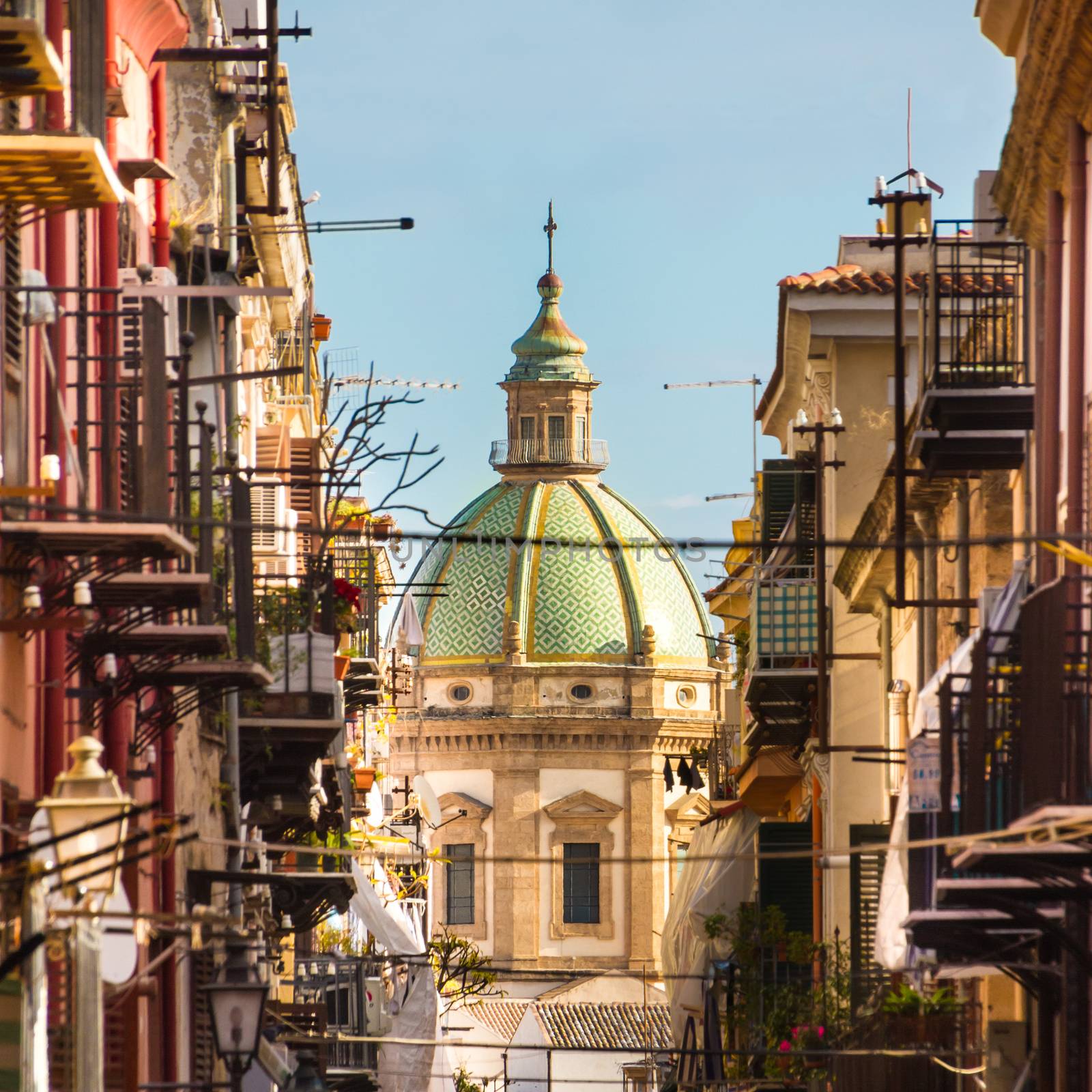 View at the church of San Matteo located in heart of Palermo, Italy, Europe;  tarditional Italian medieval city center with typical narrow residential street.