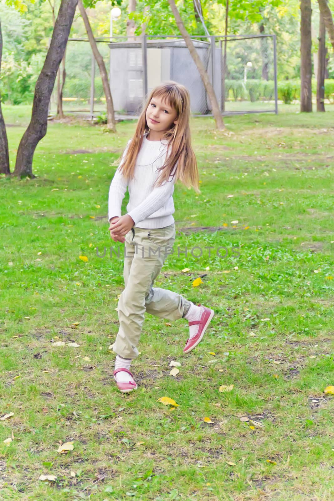Photo of cute jumping girl in summer