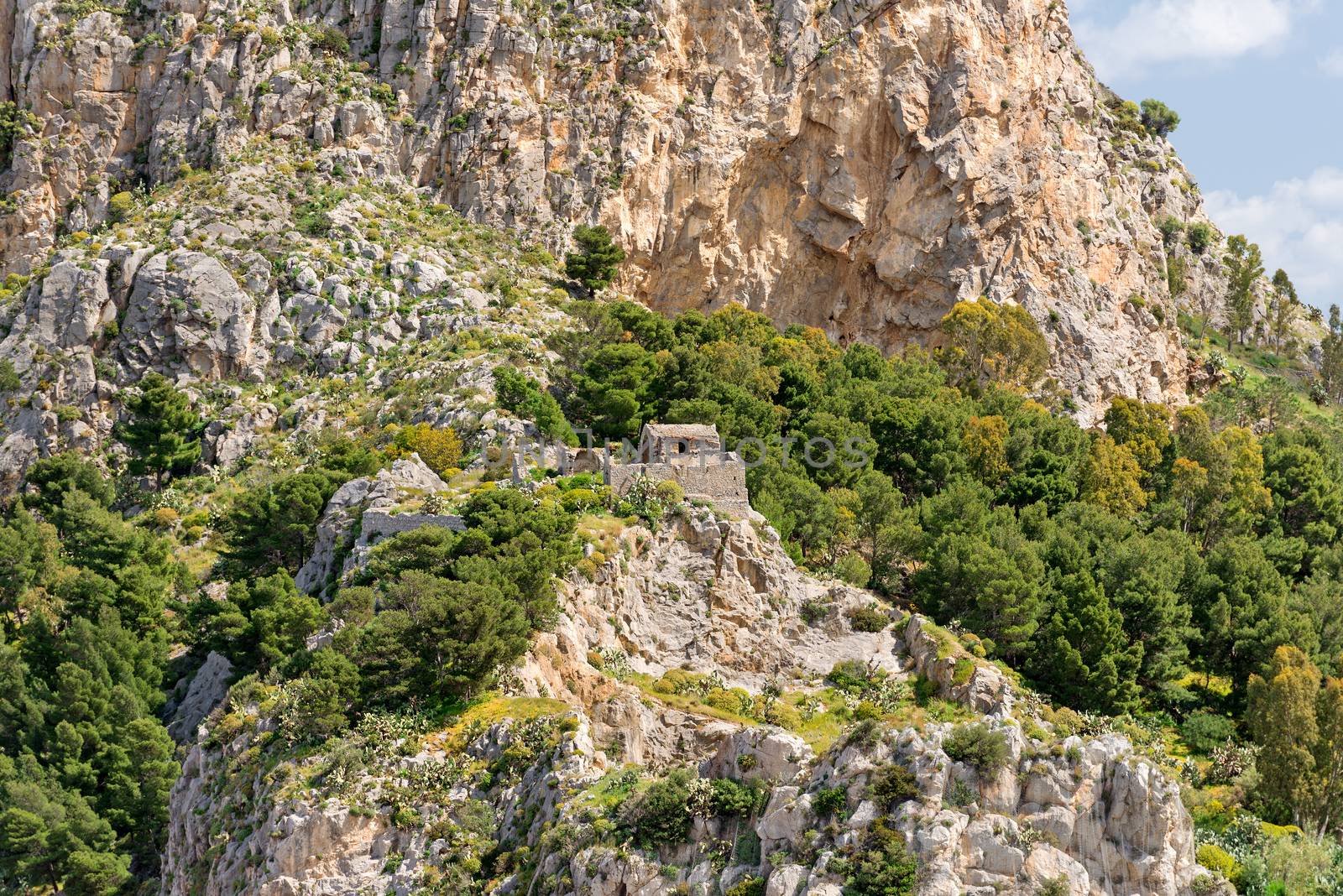 Mountain with ancient ruins at Cefalu city Sicily by Nanisimova