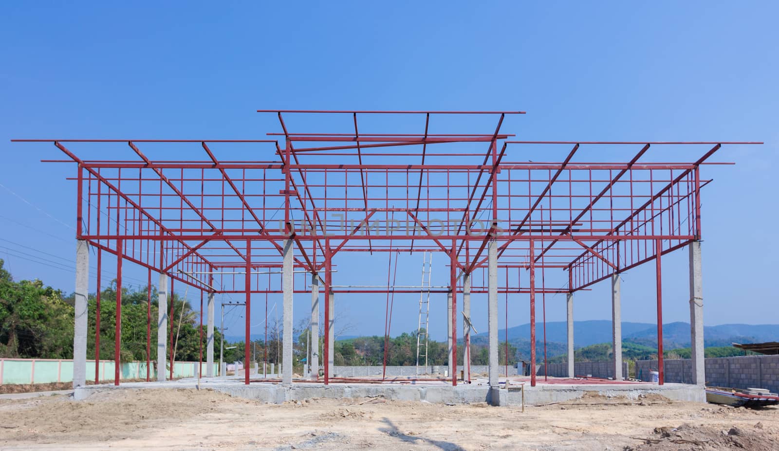 Construction site with building and steelwork