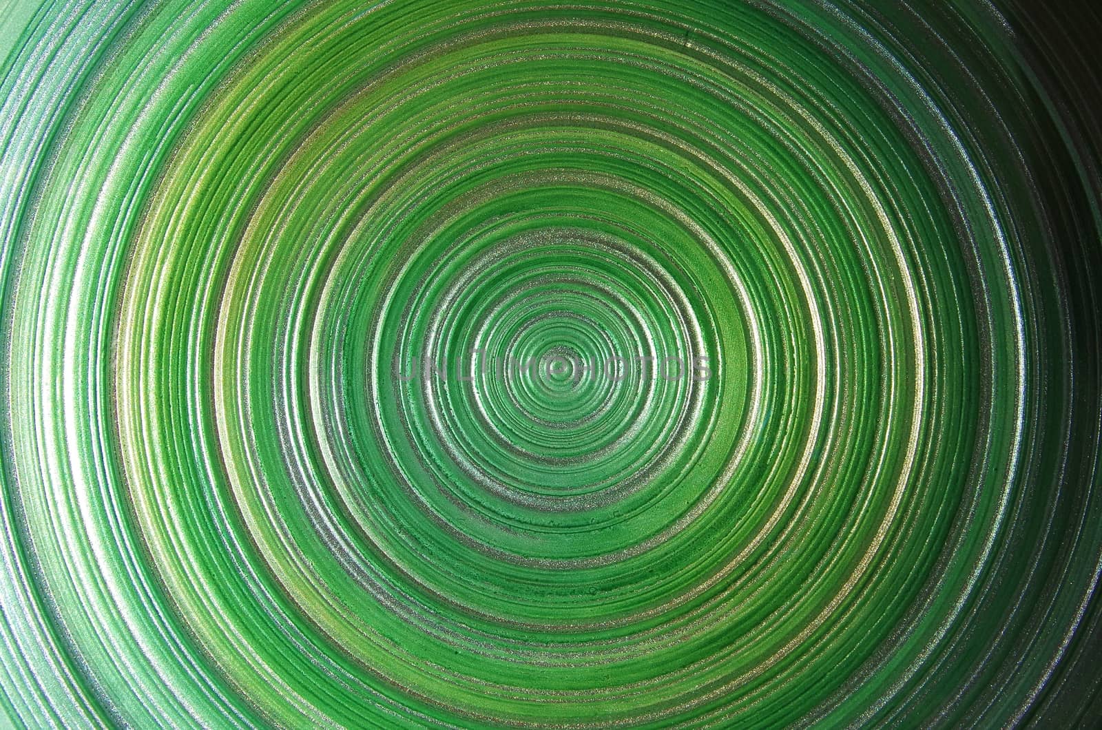 Shades of green are represented in a series of concentric circles