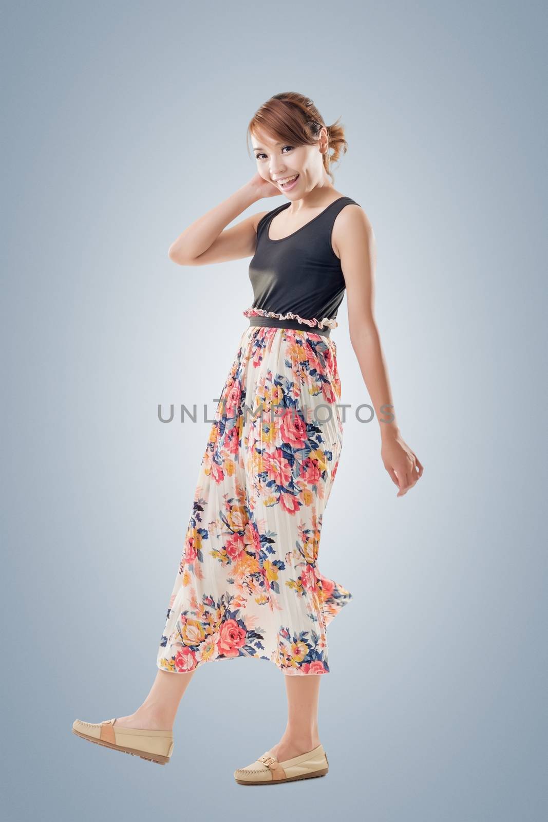 Attractive Asian woman with maxi dresses, full length isolated.