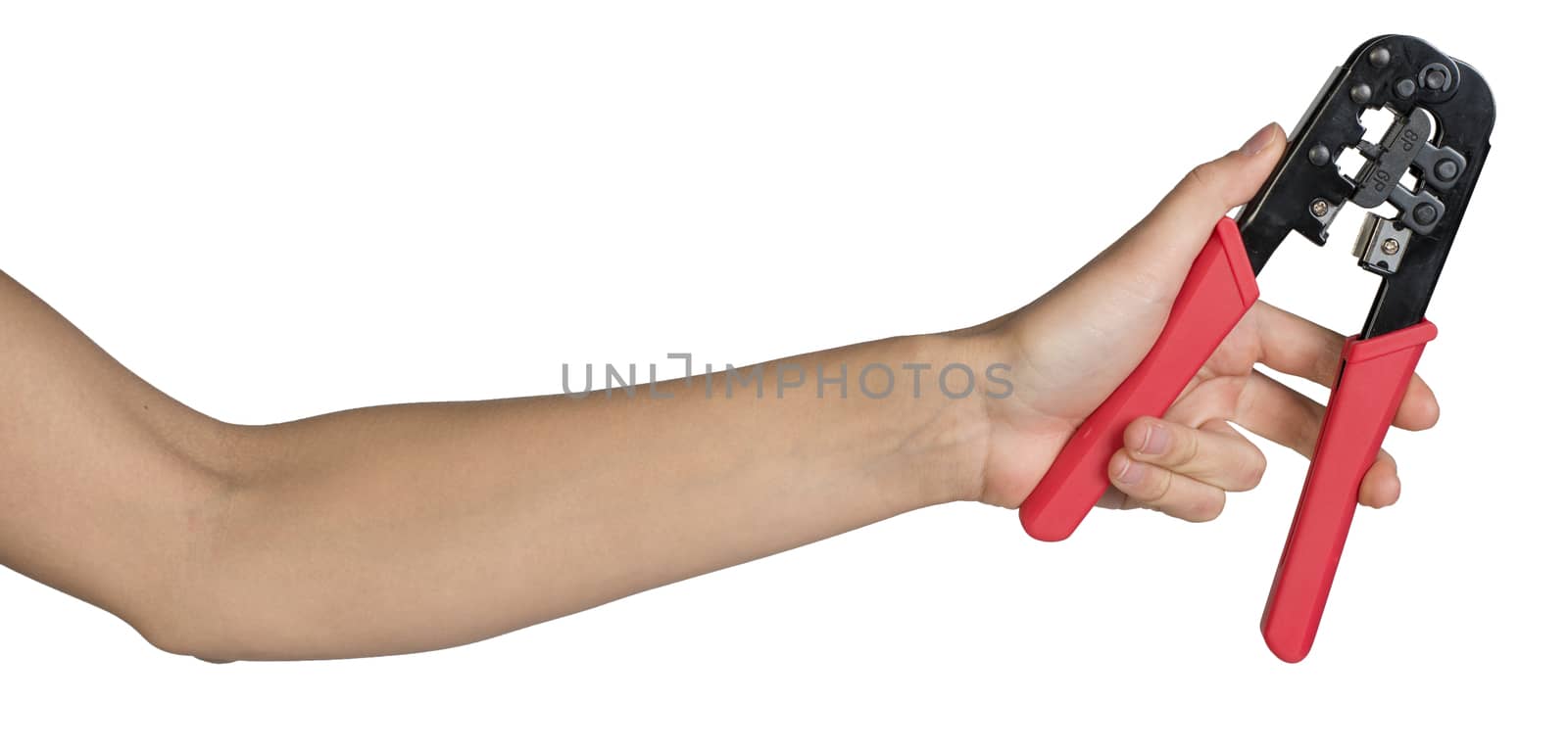 Female hand, bare, holding crimping pliers, isolated over white background
