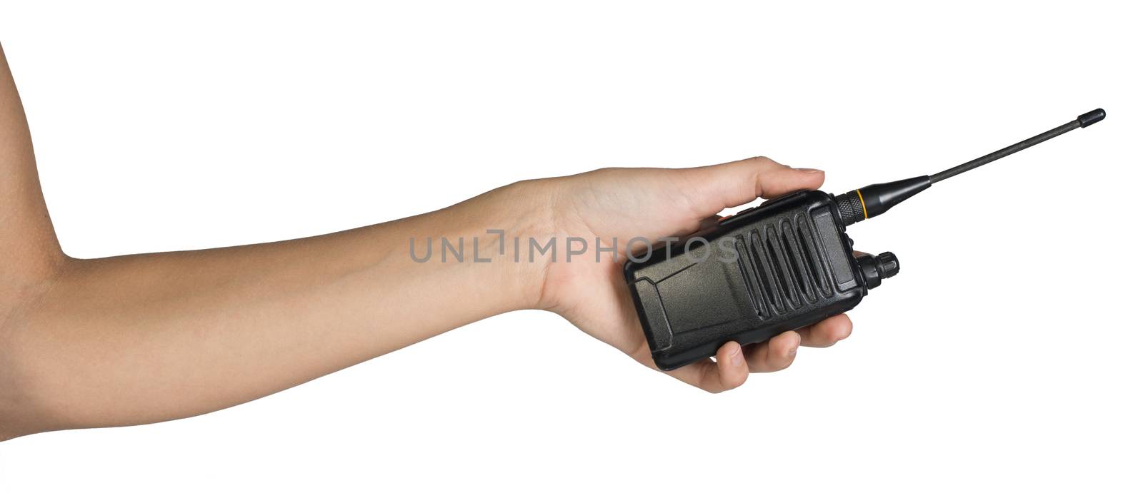 Female hand holding portable radio transmitter by cherezoff