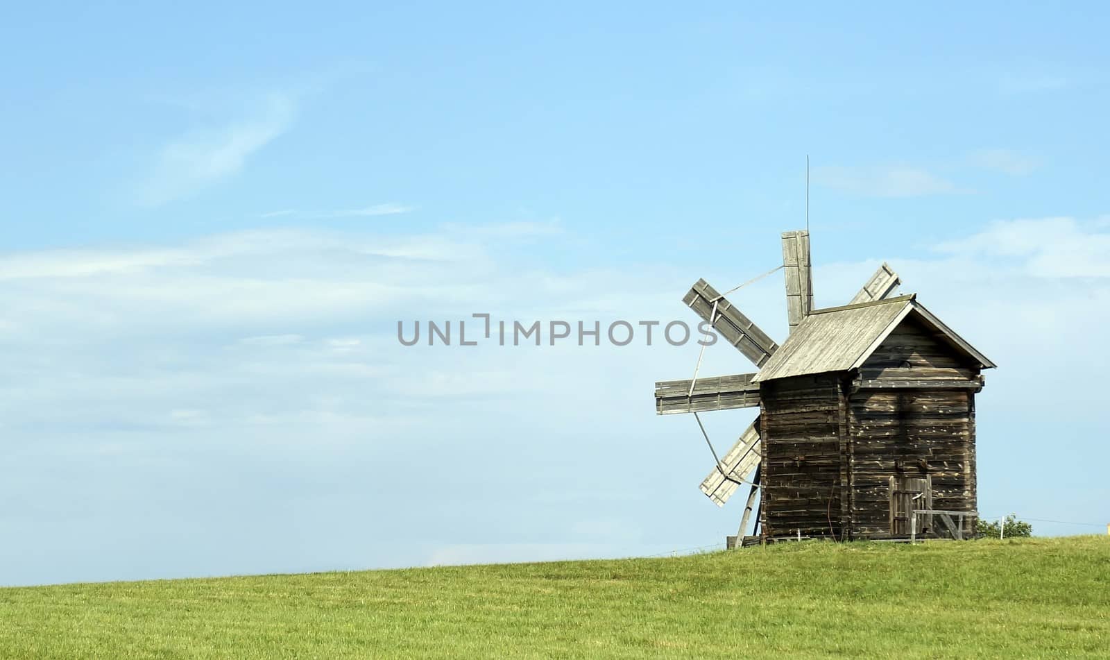 Old Russian windmill in a field, a wonderful rustic look, the background.