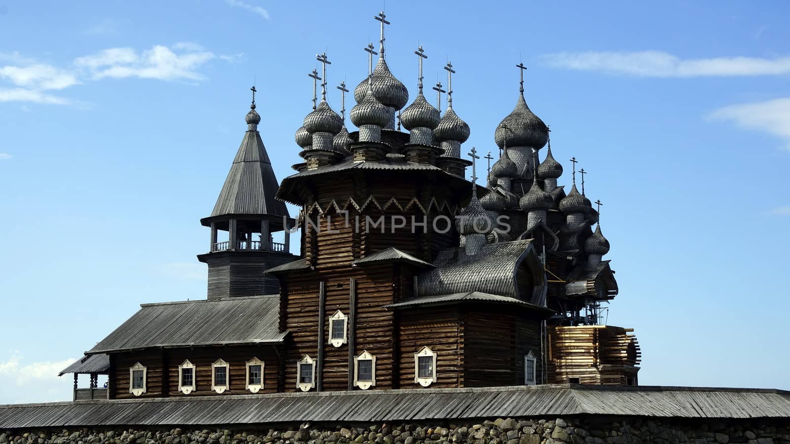 Old Russian wooden Church, the Church in the field, a wonderful rustic look, the background. by mcherevan