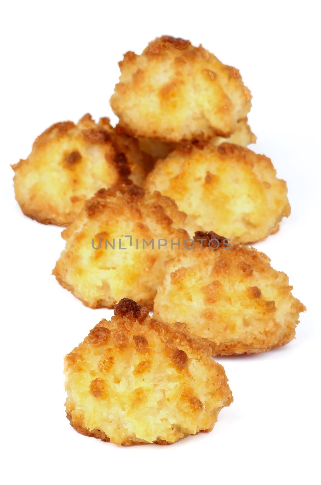 Traditional Homemade Passover Cookies Coconut Macaroons isolated on white background. Focus on Foreground