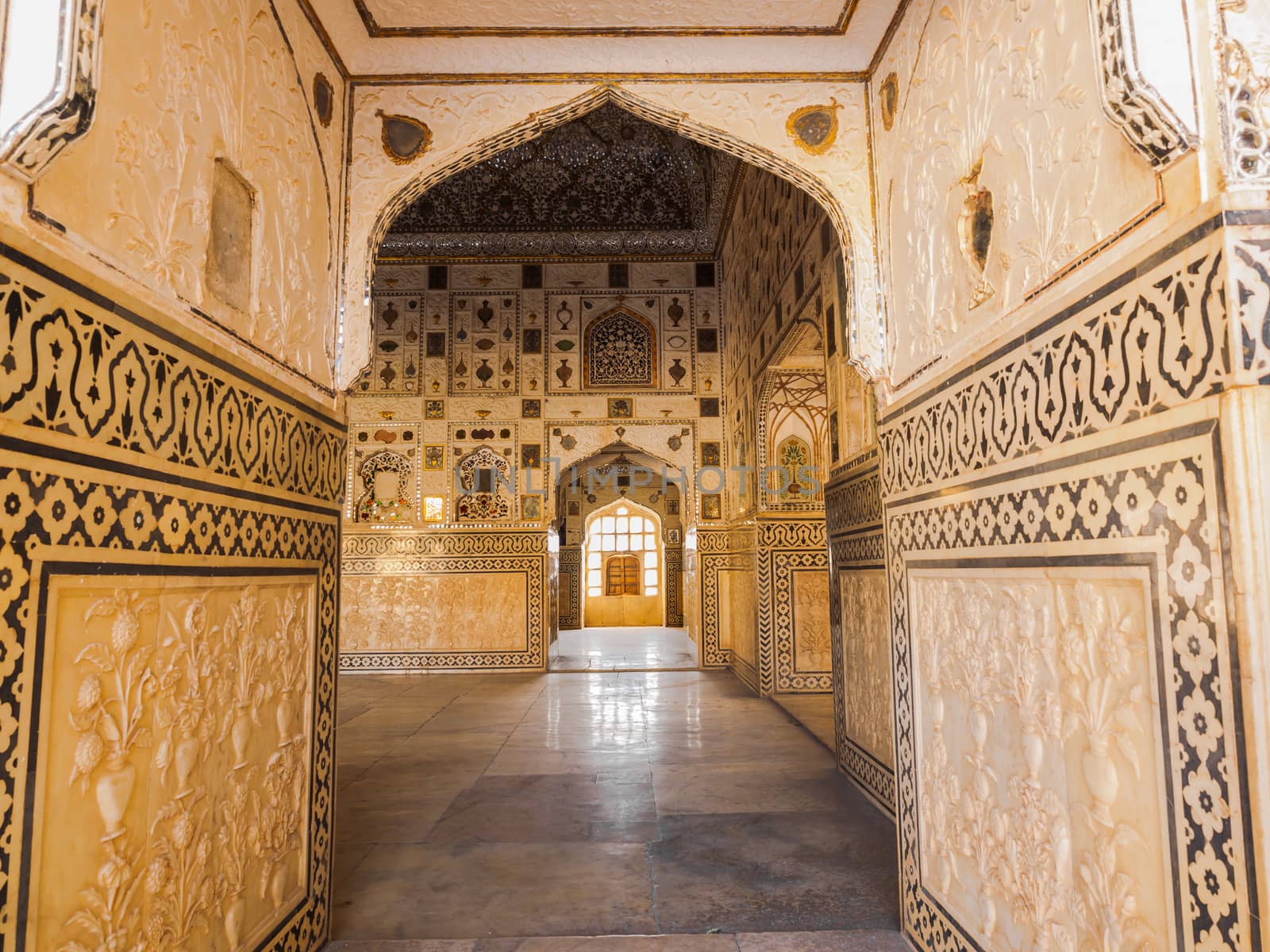 Beautiful pattern on the palace wall at Amer Fort in Jaipur, Rajasthan, India