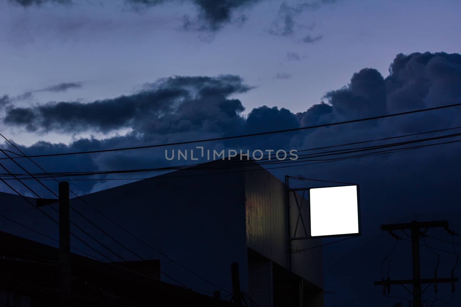small lightbox against dark sky in the evening, Blank template by a3701027