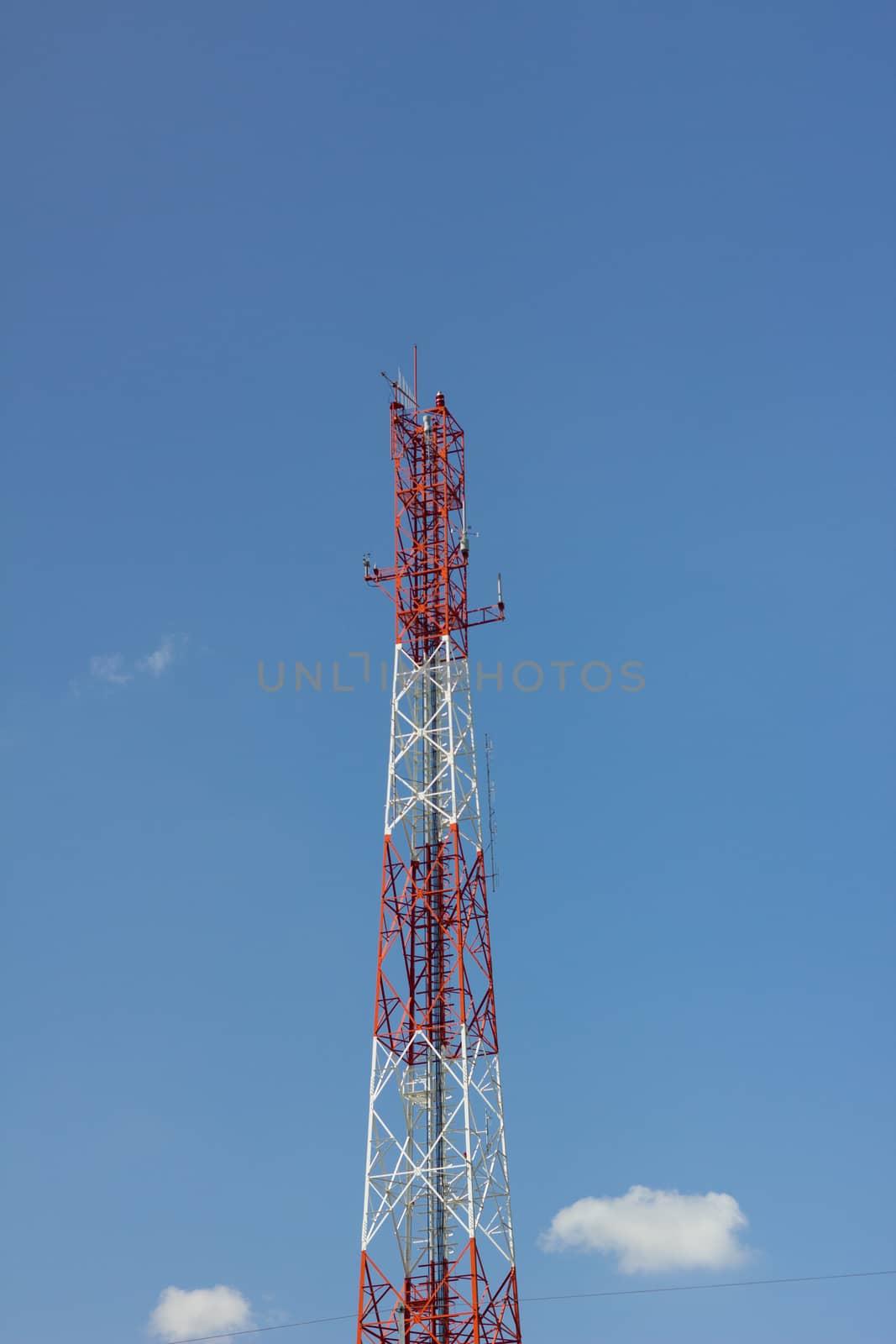 Antenna Tower of Communication, in background of blue sky by a3701027