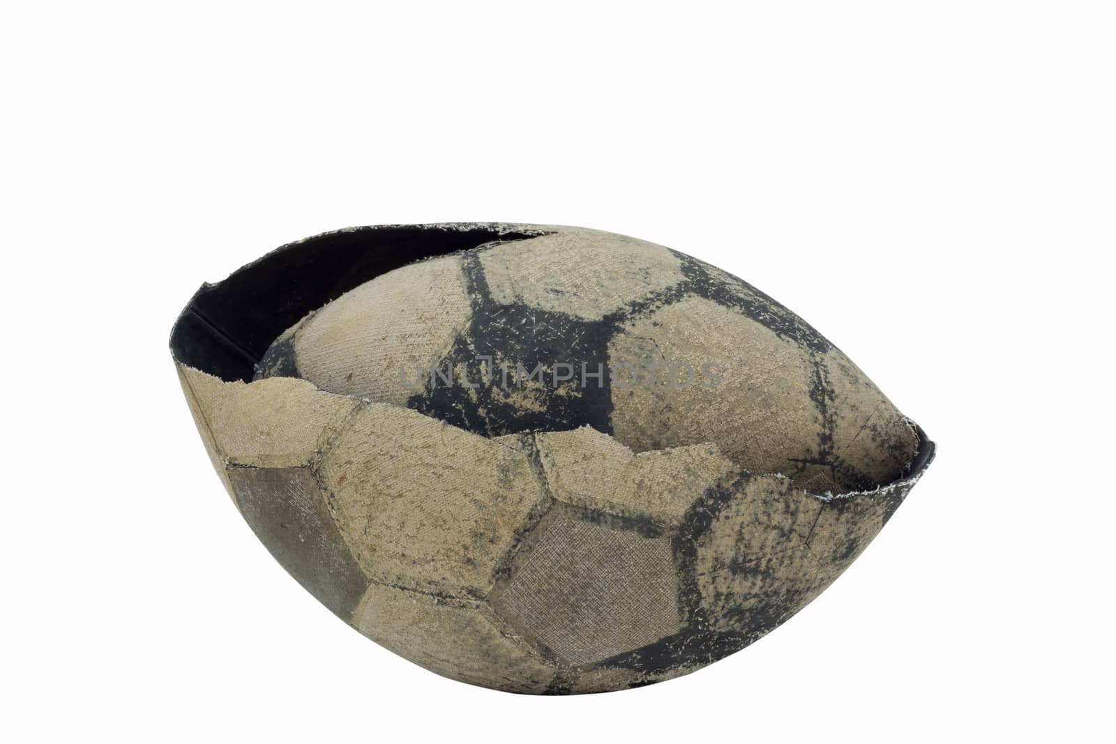 The oldbroken soccer ball isolated on white background